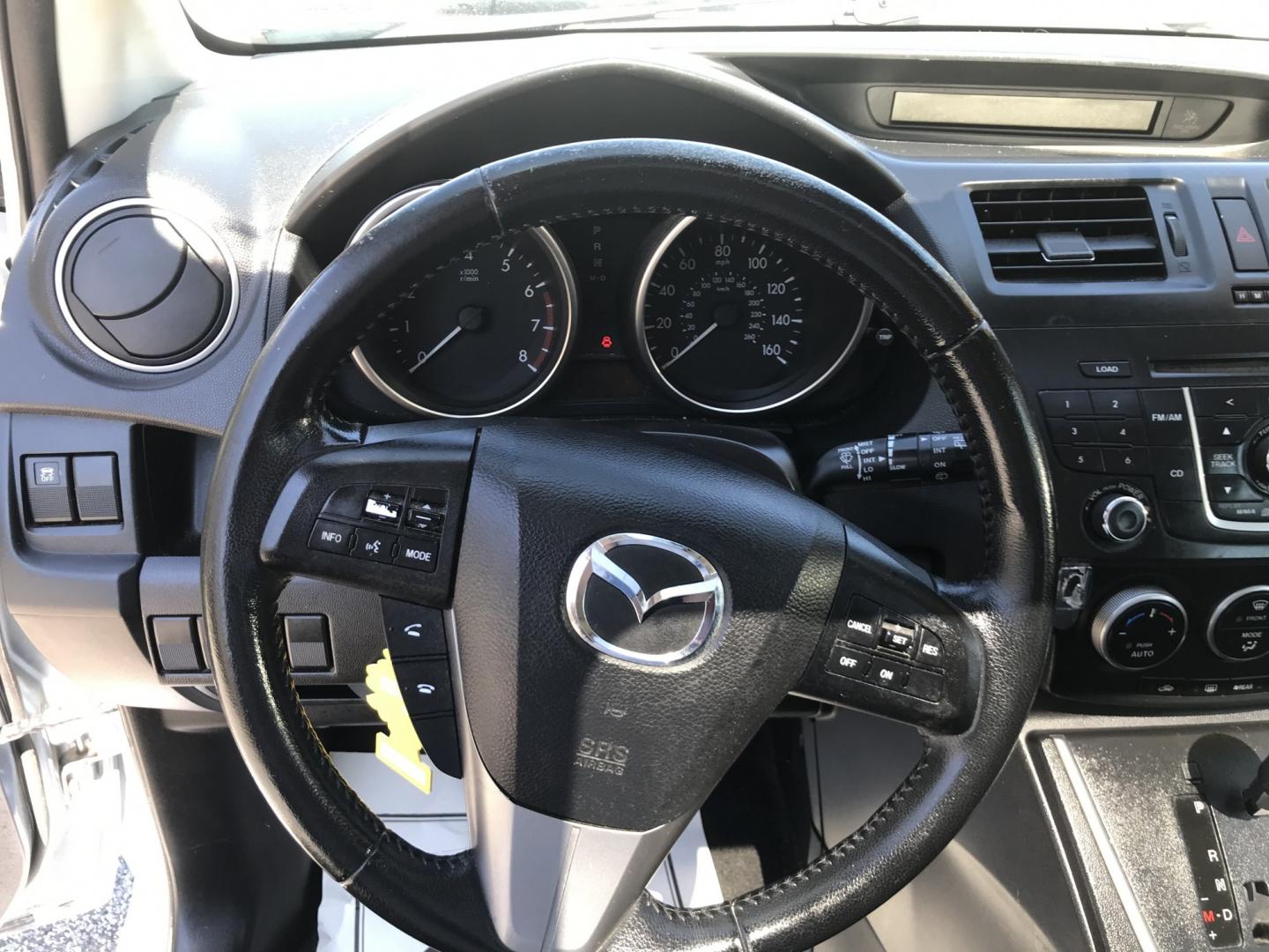 2012 Blue /Gray Mazda MAZDA5 Touring (JM1CW2CL5C0) with an 2.5L L4 DOHC 16V engine, 5-Speed Automatic transmission, located at 577 Chester Pike, Prospect Park, PA, 19076, (610) 237-1015, 39.886154, -75.302338 - 2012 Mazda 5 Touring: 3rd row seating, only 129k miles, new PA inspection, great on gas, runs LIKE NEW! This vehicle comes inspected and has been given a bumper to bumper safety check. It is very clean, reliable, and well maintained. We offer a unique pay plan that is known for being the easiest- Photo#11