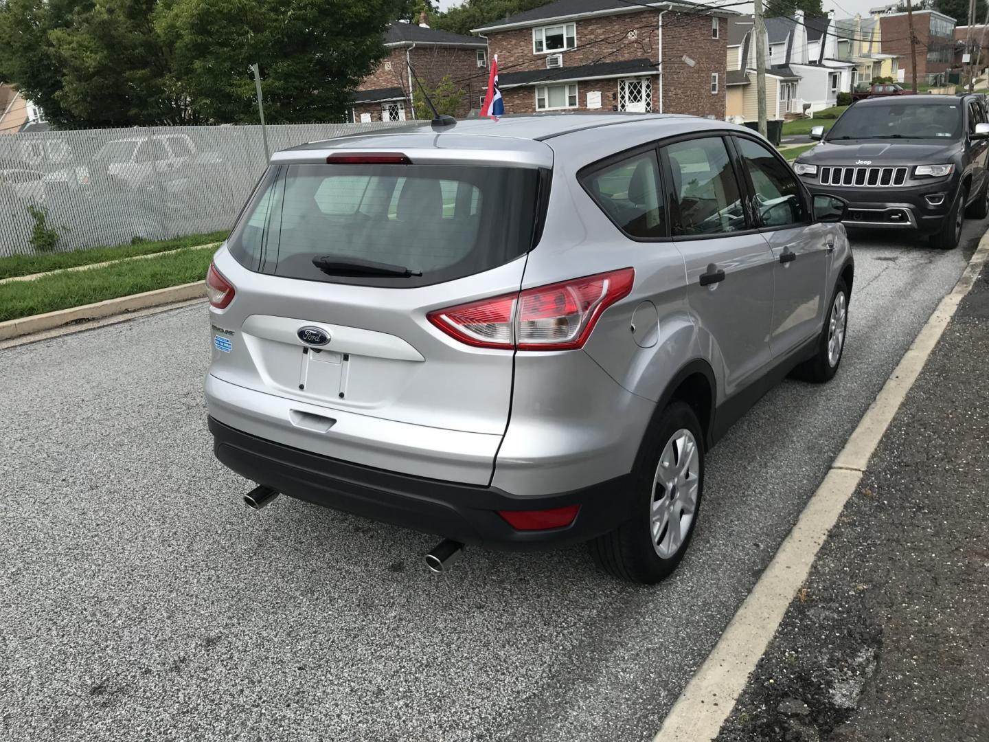 2016 Silver /Black Ford Escape S (1FMCU0F78GU) with an 2.5L L4 DOHC 16V engine, 6A transmission, located at 577 Chester Pike, Prospect Park, PA, 19076, (610) 237-1015, 39.886154, -75.302338 - 2016 Ford Escape S: Only 121k miles, great on gas, new PA inspection, SUPER CLEAN, runs LIKE NEW! This vehicle comes inspected and has been given a bumper to bumper safety check. It is very clean, reliable, and well maintained. We offer a unique pay plan that is known for being the easiest and fa- Photo#4