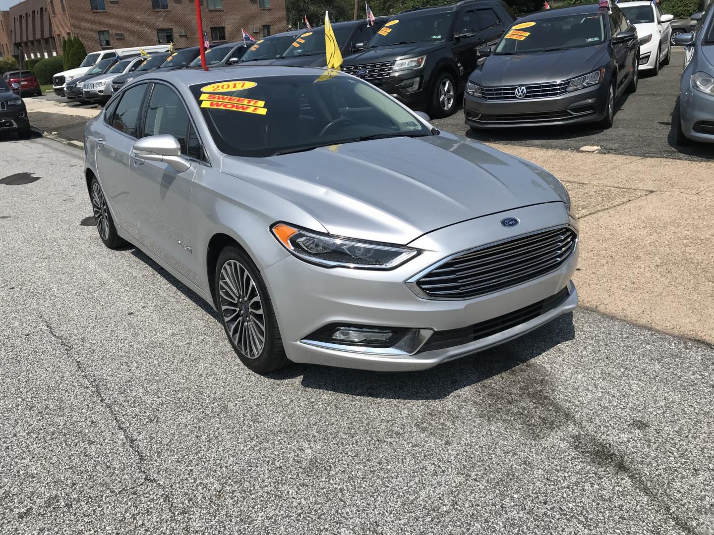 2017 Silver /Gray Ford Fusion Hybrid Titanium (3FA6P0RU4HR) with an 2.0L L4 DOHC 16V HYBRID engine, CVT transmission, located at 577 Chester Pike, Prospect Park, PA, 19076, (610) 237-1015, 39.886154, -75.302338 - 2017 Ford Fusion Titanium Hybrid: Sunroof, backup camera, new PA inspection, great on gas, SUPER CLEAN, runs LIKE NEW! This vehicle comes inspected and has been given a bumper to bumper safety check. It is very clean, reliable, and well maintained. We offer a unique pay plan that is known for bei- Photo#2