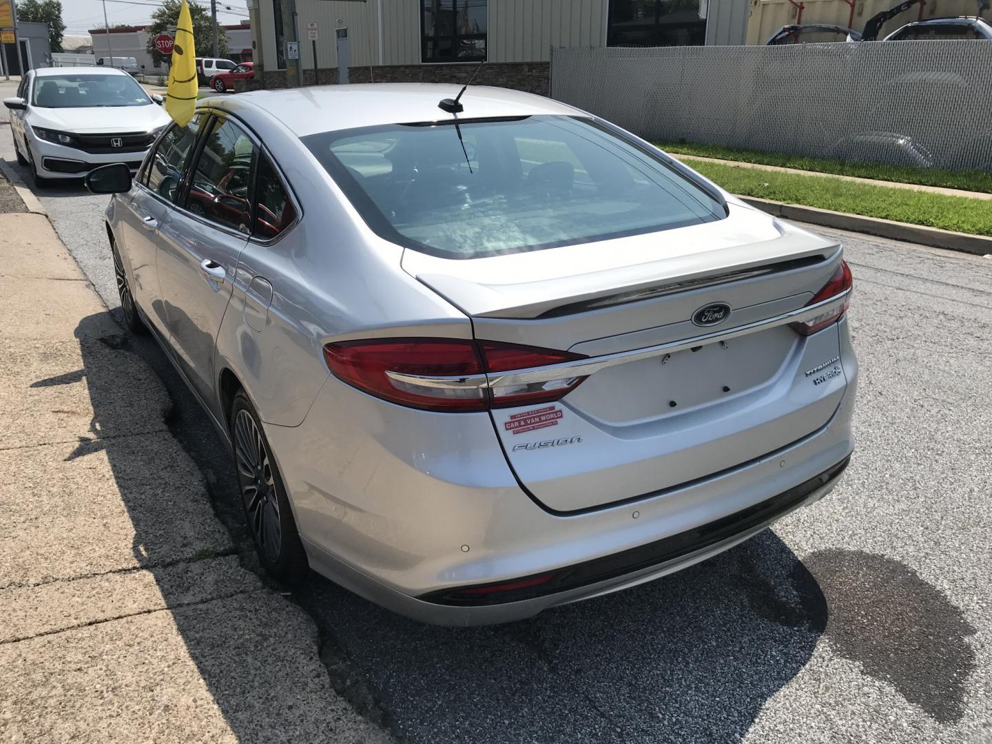 2017 Silver /Gray Ford Fusion Hybrid Titanium (3FA6P0RU4HR) with an 2.0L L4 DOHC 16V HYBRID engine, CVT transmission, located at 577 Chester Pike, Prospect Park, PA, 19076, (610) 237-1015, 39.886154, -75.302338 - 2017 Ford Fusion Titanium Hybrid: Sunroof, backup camera, new PA inspection, great on gas, SUPER CLEAN, runs LIKE NEW! This vehicle comes inspected and has been given a bumper to bumper safety check. It is very clean, reliable, and well maintained. We offer a unique pay plan that is known for bei- Photo#6