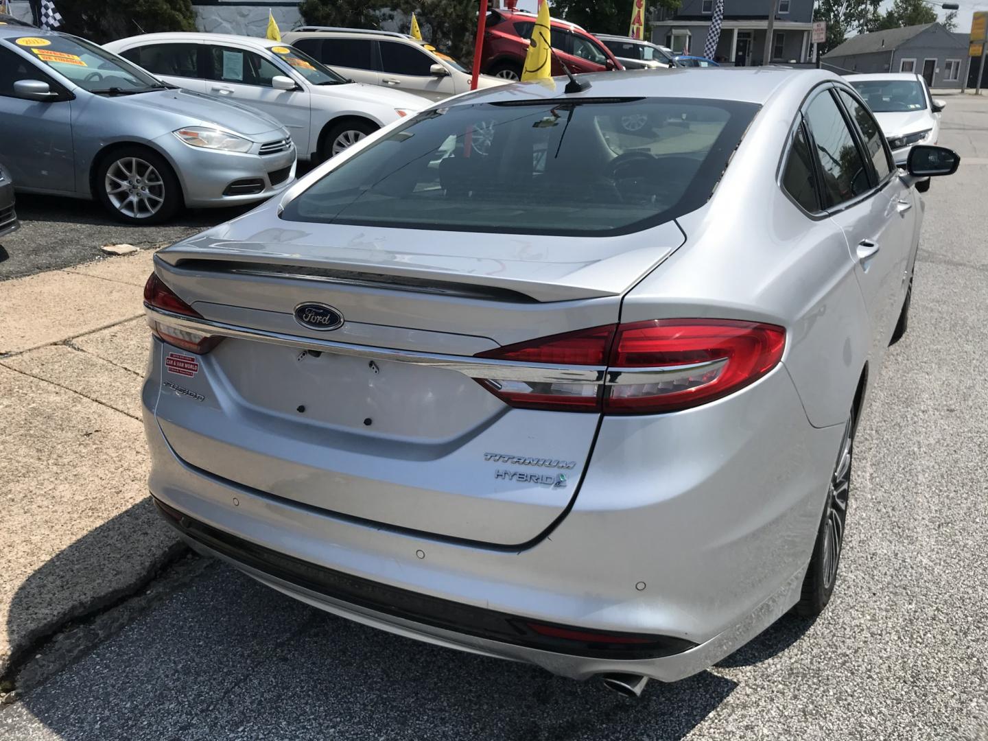 2017 Silver /Gray Ford Fusion Hybrid Titanium (3FA6P0RU4HR) with an 2.0L L4 DOHC 16V HYBRID engine, CVT transmission, located at 577 Chester Pike, Prospect Park, PA, 19076, (610) 237-1015, 39.886154, -75.302338 - 2017 Ford Fusion Titanium Hybrid: Sunroof, backup camera, new PA inspection, great on gas, SUPER CLEAN, runs LIKE NEW! This vehicle comes inspected and has been given a bumper to bumper safety check. It is very clean, reliable, and well maintained. We offer a unique pay plan that is known for bei- Photo#7