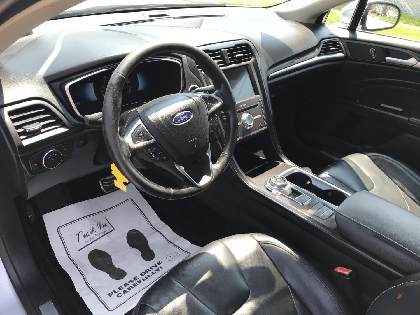 2017 Silver /Gray Ford Fusion Hybrid Titanium (3FA6P0RU4HR) with an 2.0L L4 DOHC 16V HYBRID engine, CVT transmission, located at 577 Chester Pike, Prospect Park, PA, 19076, (610) 237-1015, 39.886154, -75.302338 - 2017 Ford Fusion Titanium Hybrid: Sunroof, backup camera, new PA inspection, great on gas, SUPER CLEAN, runs LIKE NEW! This vehicle comes inspected and has been given a bumper to bumper safety check. It is very clean, reliable, and well maintained. We offer a unique pay plan that is known for bei- Photo#12