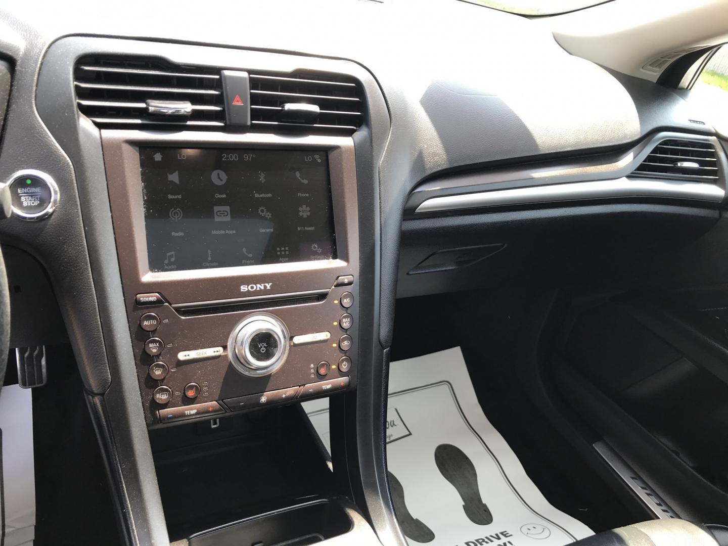 2017 Silver /Gray Ford Fusion Hybrid Titanium (3FA6P0RU4HR) with an 2.0L L4 DOHC 16V HYBRID engine, CVT transmission, located at 577 Chester Pike, Prospect Park, PA, 19076, (610) 237-1015, 39.886154, -75.302338 - 2017 Ford Fusion Titanium Hybrid: Sunroof, backup camera, new PA inspection, great on gas, SUPER CLEAN, runs LIKE NEW! This vehicle comes inspected and has been given a bumper to bumper safety check. It is very clean, reliable, and well maintained. We offer a unique pay plan that is known for bei- Photo#14