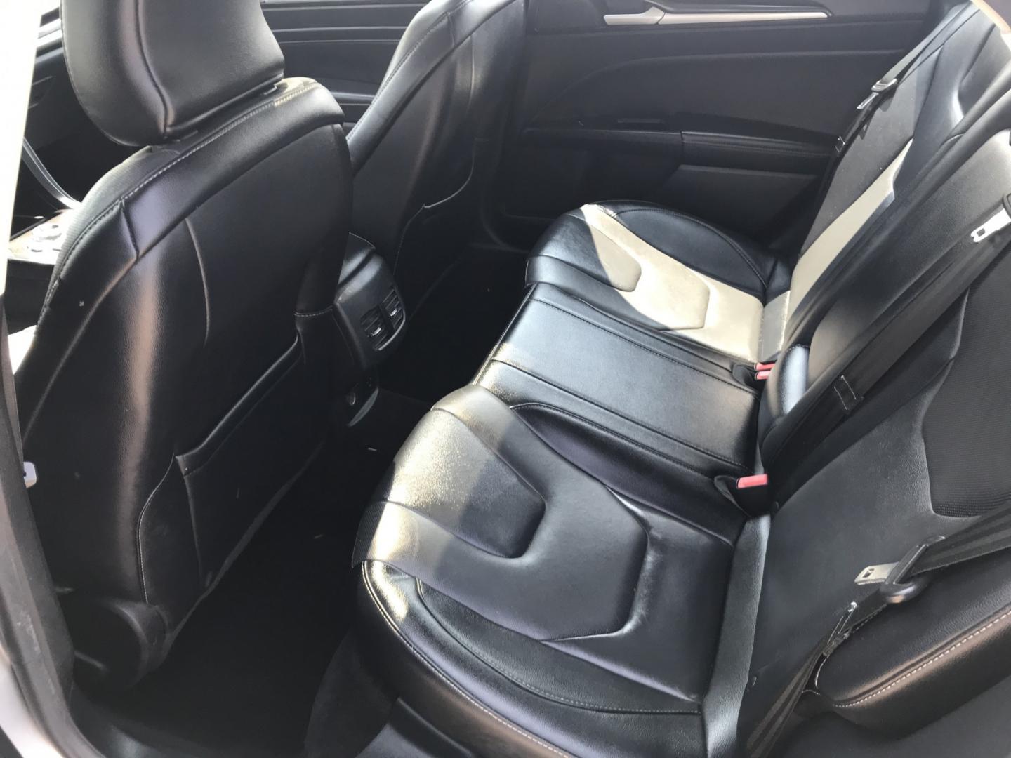 2017 Silver /Gray Ford Fusion Hybrid Titanium (3FA6P0RU4HR) with an 2.0L L4 DOHC 16V HYBRID engine, CVT transmission, located at 577 Chester Pike, Prospect Park, PA, 19076, (610) 237-1015, 39.886154, -75.302338 - 2017 Ford Fusion Titanium Hybrid: Sunroof, backup camera, new PA inspection, great on gas, SUPER CLEAN, runs LIKE NEW! This vehicle comes inspected and has been given a bumper to bumper safety check. It is very clean, reliable, and well maintained. We offer a unique pay plan that is known for bei- Photo#18