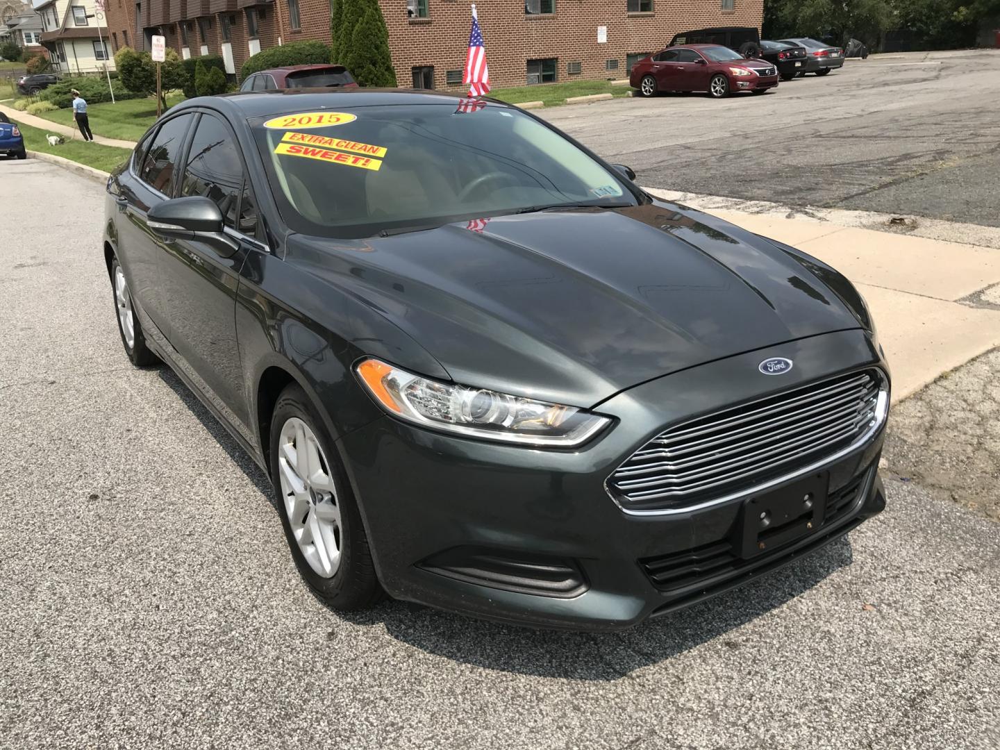 2015 Green /Beige Ford Fusion SE (1FA6P0H74F5) with an 2.5L L4 DOHC 16V engine, Automatic transmission, located at 577 Chester Pike, Prospect Park, PA, 19076, (610) 237-1015, 39.886154, -75.302338 - 2015 Ford Fusion SE: Only 88k miles, backup camera, new PA inspection, runs LIKE NEW! This vehicle comes inspected and has been given a bumper to bumper safety check. It is very clean, reliable, and well maintained. We offer a unique pay plan that is known for being the easiest and fastest financ- Photo#2