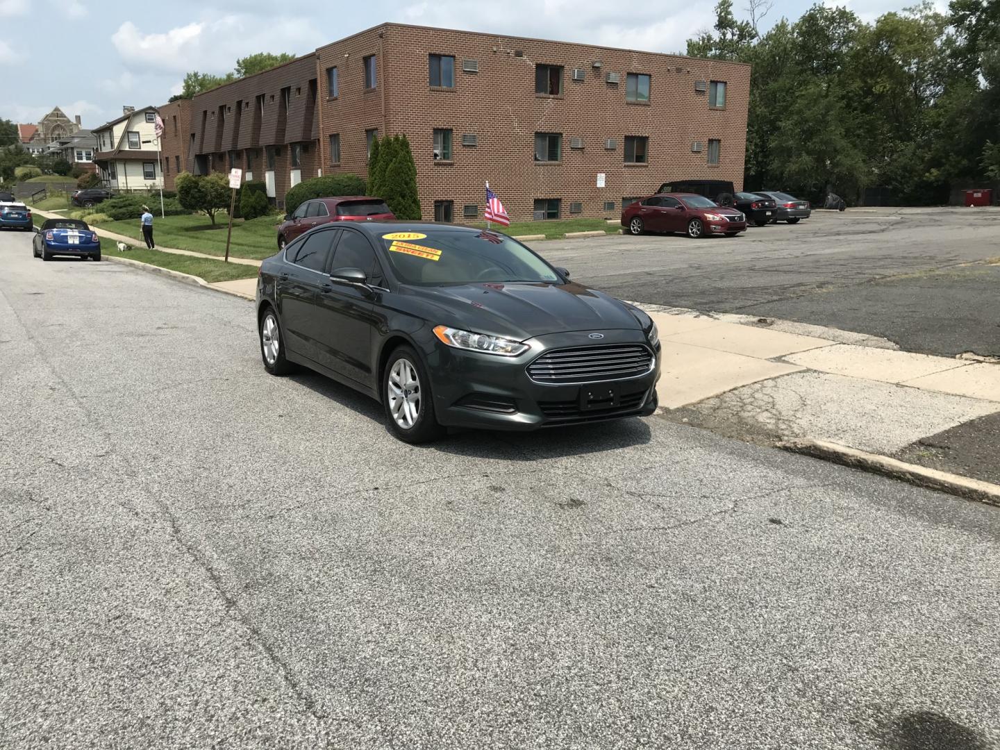 2015 Green /Beige Ford Fusion SE (1FA6P0H74F5) with an 2.5L L4 DOHC 16V engine, Automatic transmission, located at 577 Chester Pike, Prospect Park, PA, 19076, (610) 237-1015, 39.886154, -75.302338 - 2015 Ford Fusion SE: Only 88k miles, backup camera, new PA inspection, runs LIKE NEW! This vehicle comes inspected and has been given a bumper to bumper safety check. It is very clean, reliable, and well maintained. We offer a unique pay plan that is known for being the easiest and fastest financ- Photo#1