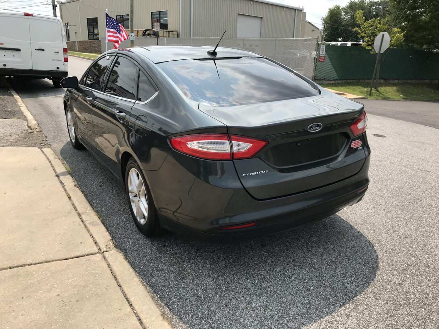 2015 Green /Beige Ford Fusion SE (1FA6P0H74F5) with an 2.5L L4 DOHC 16V engine, Automatic transmission, located at 577 Chester Pike, Prospect Park, PA, 19076, (610) 237-1015, 39.886154, -75.302338 - 2015 Ford Fusion SE: Only 88k miles, backup camera, new PA inspection, runs LIKE NEW! This vehicle comes inspected and has been given a bumper to bumper safety check. It is very clean, reliable, and well maintained. We offer a unique pay plan that is known for being the easiest and fastest financ- Photo#6