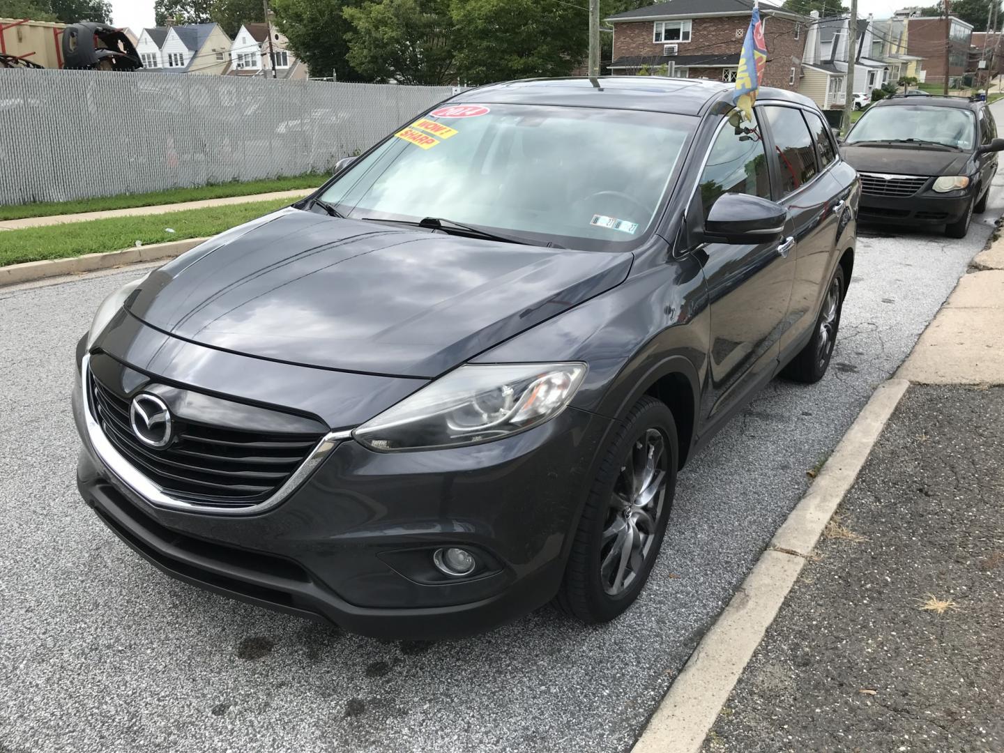 2014 Gray /Black Mazda CX-9 Grand Touring AWD (JM3TB3DVXE0) with an 3.7L V6 DOHC 24V engine, 6A transmission, located at 577 Chester Pike, Prospect Park, PA, 19076, (610) 237-1015, 39.886154, -75.302338 - 2014 Mazda CX-9 Grand Touring: Sunroof, 3rd row seating, backup camera, new PA inspection, SUPER CLEAN, runs LIKE NEW! This vehicle comes inspected and has been given a bumper to bumper safety check. It is very clean, reliable, and well maintained. We offer a unique pay plan that is known for bei- Photo#3