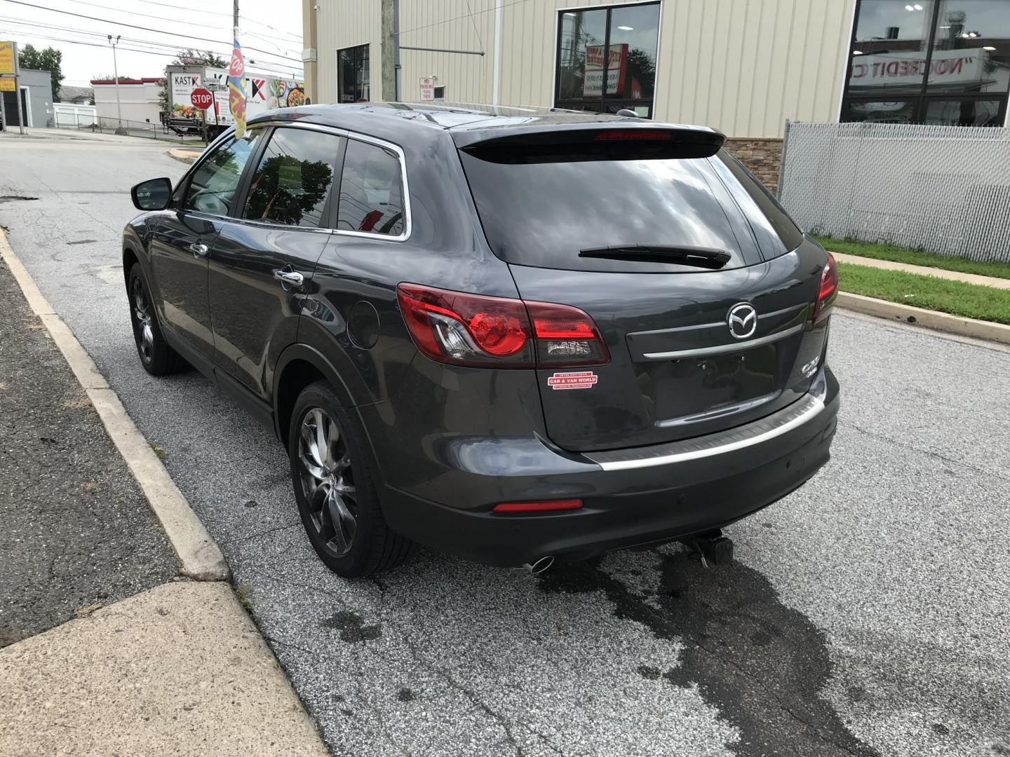 2014 Gray /Black Mazda CX-9 Grand Touring AWD (JM3TB3DVXE0) with an 3.7L V6 DOHC 24V engine, 6A transmission, located at 577 Chester Pike, Prospect Park, PA, 19076, (610) 237-1015, 39.886154, -75.302338 - 2014 Mazda CX-9 Grand Touring: Sunroof, 3rd row seating, backup camera, new PA inspection, SUPER CLEAN, runs LIKE NEW! This vehicle comes inspected and has been given a bumper to bumper safety check. It is very clean, reliable, and well maintained. We offer a unique pay plan that is known for bei- Photo#6