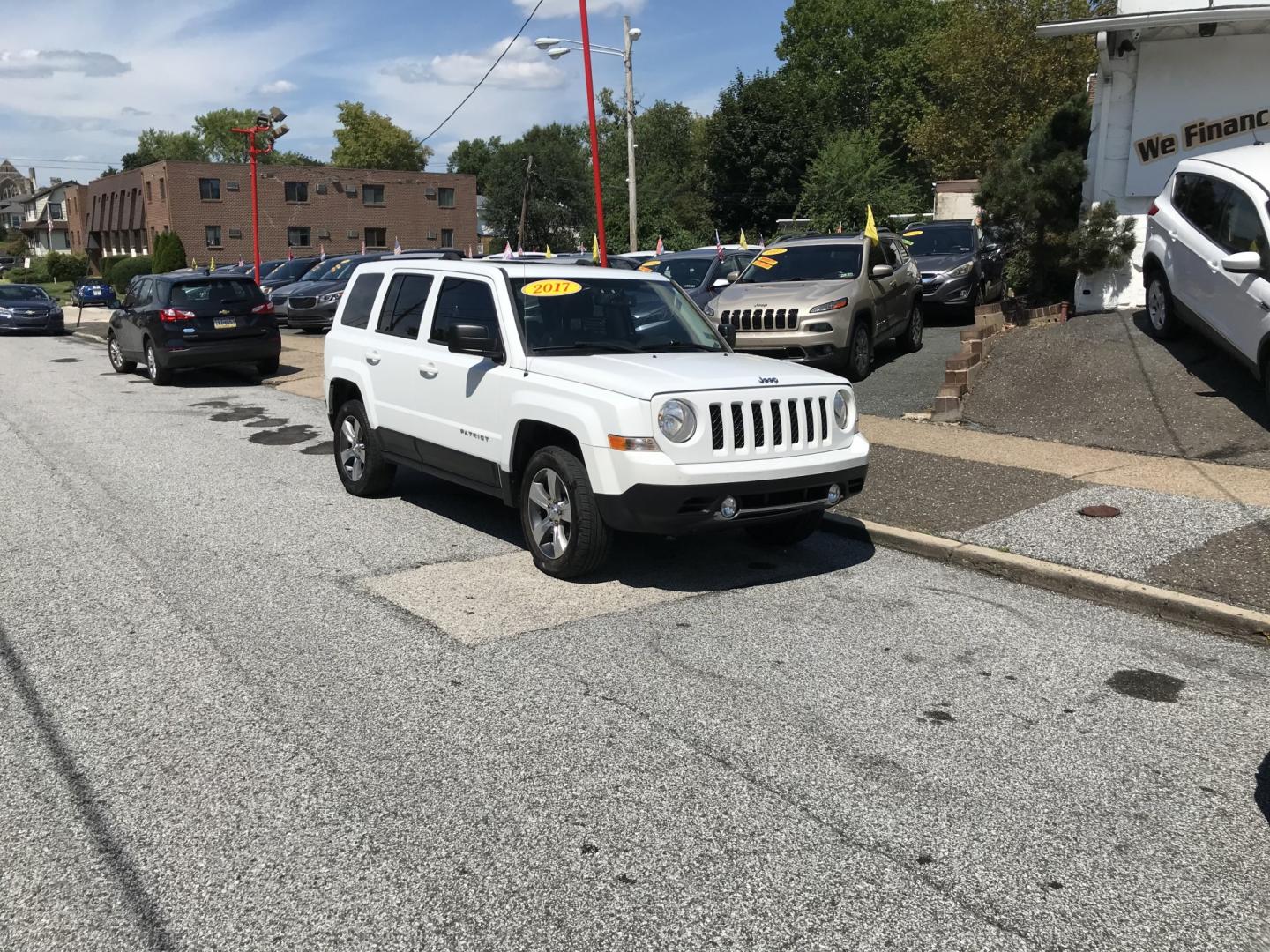 2017 White /Black Jeep Patriot Latitude 4WD (1C4NJRFB7HD) with an 2.4L L4 DOHC 16V engine, Automatic transmission, located at 577 Chester Pike, Prospect Park, PA, 19076, (610) 237-1015, 39.886154, -75.302338 - 2017 Jeep Patriot Latitude: Only 121k miles, sunroof, 4x4, new PA inspection, SUPER CLEAN, runs LIKE NEW! This vehicle comes inspected and has been given a bumper to bumper safety check. It is very clean, reliable, and well maintained. We offer a unique pay plan that is known for being the easies- Photo#1