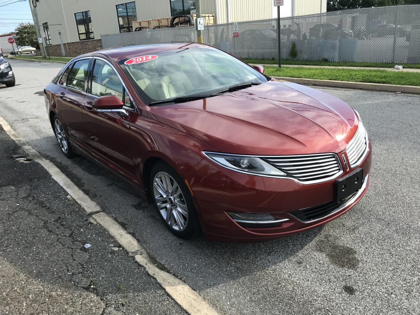 2014 Red /Beige Lincoln MKZ AWD (3LN6L2J9XER) with an 2.0L L4 DOHC 16V engine, 6-Speed Automatic transmission, located at 577 Chester Pike, Prospect Park, PA, 19076, (610) 237-1015, 39.886154, -75.302338 - 2014 Lincoln MKZ: AWD, navigation system, backup camera, sunroof, new PA inspection, SUPER CLEAN, runs LIKE NEW! This vehicle comes inspected and has been given a bumper to bumper safety check. It is very clean, reliable, and well maintained. We offer a unique pay plan that is known for being the- Photo#3