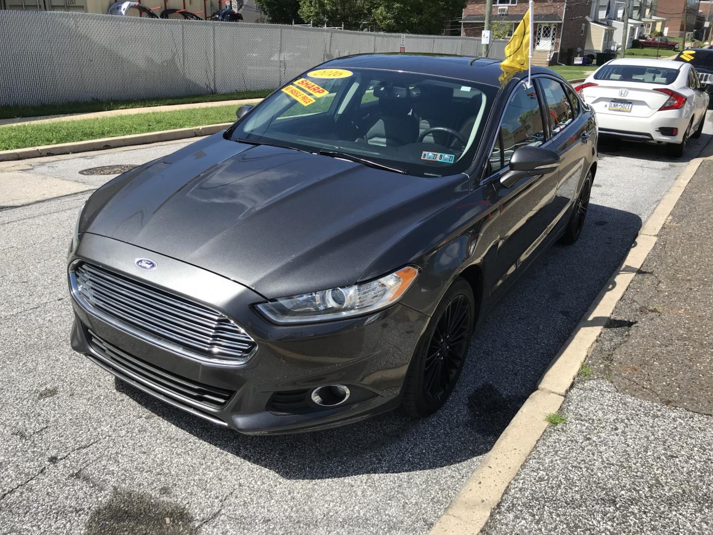 2016 Gray /Black Ford Fusion SE AWD (3FA6P0T90GR) with an 2.0L L4 DOHC 16V engine, 6A transmission, located at 577 Chester Pike, Prospect Park, PA, 19076, (610) 237-1015, 39.886154, -75.302338 - 2016 Ford Fusion SE AWD: Navigation system, remote start, backup camera, sunroof, new PA inspection, SUPER CLEAN, runs LIKE NEW! This vehicle comes inspected and has been given a bumper to bumper safety check. It is very clean, reliable, and well maintained. We offer a unique pay plan that is kno- Photo#3