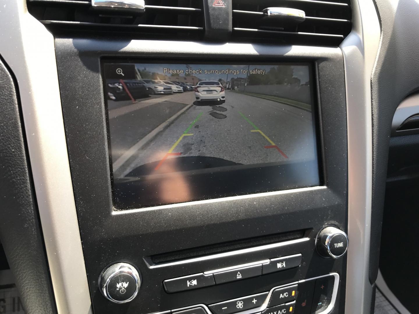 2016 Gray /Black Ford Fusion SE AWD (3FA6P0T90GR) with an 2.0L L4 DOHC 16V engine, 6A transmission, located at 577 Chester Pike, Prospect Park, PA, 19076, (610) 237-1015, 39.886154, -75.302338 - 2016 Ford Fusion SE AWD: Navigation system, remote start, backup camera, sunroof, new PA inspection, SUPER CLEAN, runs LIKE NEW! This vehicle comes inspected and has been given a bumper to bumper safety check. It is very clean, reliable, and well maintained. We offer a unique pay plan that is kno- Photo#16
