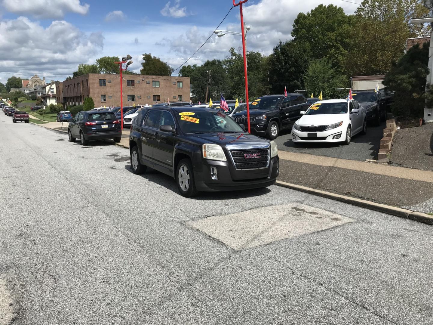 2015 Gray /Gray GMC Terrain SLE1 AWD (2GKFLVEK3F6) with an 2.4L L4 DOHC 16V FFV engine, 6A transmission, located at 577 Chester Pike, Prospect Park, PA, 19076, (610) 237-1015, 39.886154, -75.302338- Photo#1