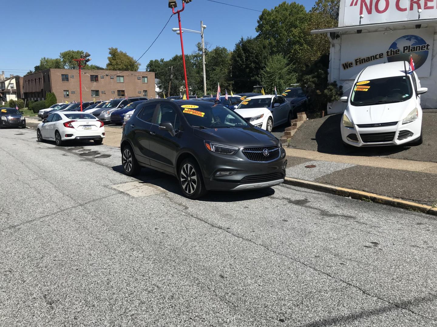 2017 Gray /Gray Buick Encore Essence AWD (KL4CJGSB2HB) with an 1.4L L4 DOHC 16V TURBO engine, 6A transmission, located at 577 Chester Pike, Prospect Park, PA, 19076, (610) 237-1015, 39.886154, -75.302338 - 2017 Buick Encore Essence: AWD, backup camera, sunroof, great on gas, new PA inspection, SUPER CLEAN, runs LIKE NEW! This vehicle comes inspected and has been given a bumper to bumper safety check. It is very clean, reliable, and well maintained. We offer a unique pay plan that is known for being- Photo#1