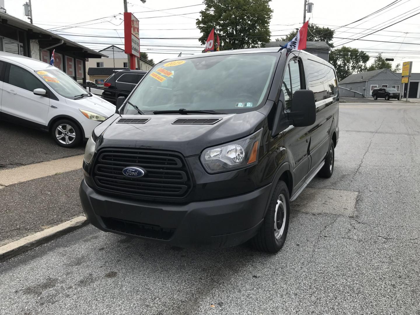 2019 Black /Gray Ford Transit 150 Van Low Roof 60/40 Pass. 130-in. WB (1FTYE1ZM3KK) with an 3.7L V6 DOHC 24V engine, 6A transmission, located at 577 Chester Pike, Prospect Park, PA, 19076, (610) 237-1015, 39.886154, -75.302338 - 2019 Ford Transit 150: FLEET MAINTAINED, new PA inspection, partition, backup camera, cages over windows, SUPER CLEAN! This vehicle comes inspected and has been given a bumper to bumper safety check. It is very clean, reliable, and well maintained. We offer a unique pay plan that is known for bei- Photo#2