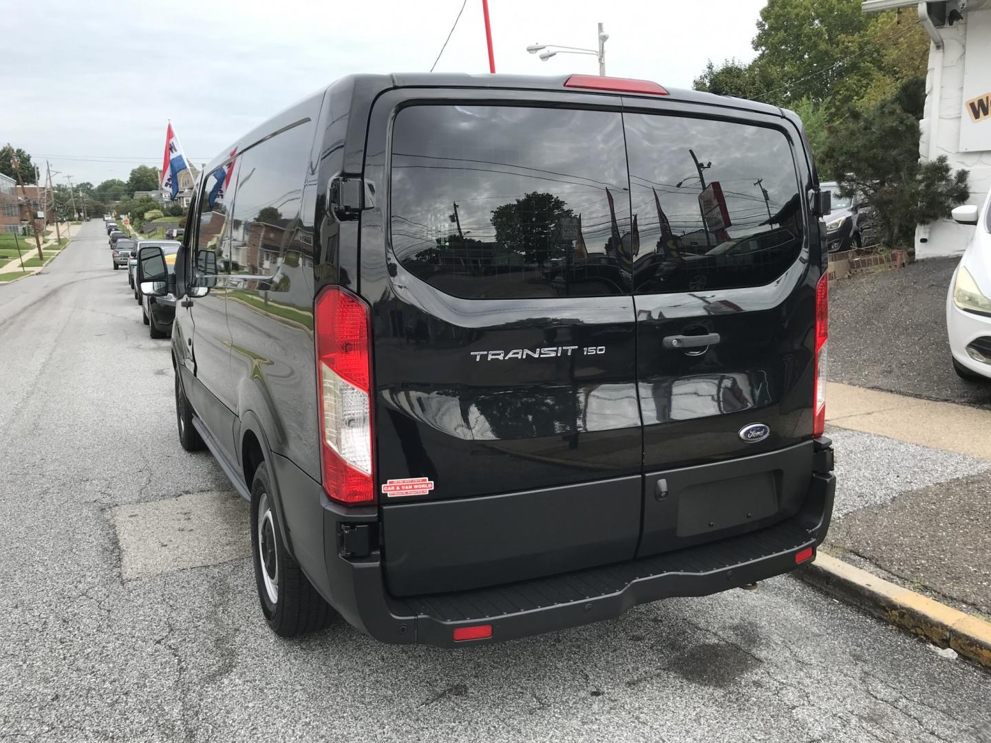 2019 Black /Gray Ford Transit 150 Van Low Roof 60/40 Pass. 130-in. WB (1FTYE1ZM3KK) with an 3.7L V6 DOHC 24V engine, 6A transmission, located at 577 Chester Pike, Prospect Park, PA, 19076, (610) 237-1015, 39.886154, -75.302338 - 2019 Ford Transit 150: FLEET MAINTAINED, new PA inspection, partition, backup camera, cages over windows, SUPER CLEAN! This vehicle comes inspected and has been given a bumper to bumper safety check. It is very clean, reliable, and well maintained. We offer a unique pay plan that is known for bei- Photo#5