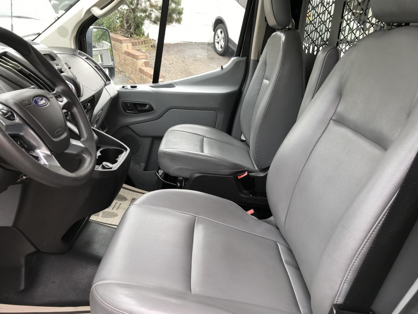 2019 Black /Gray Ford Transit 150 Van Low Roof 60/40 Pass. 130-in. WB (1FTYE1ZM3KK) with an 3.7L V6 DOHC 24V engine, 6A transmission, located at 577 Chester Pike, Prospect Park, PA, 19076, (610) 237-1015, 39.886154, -75.302338 - 2019 Ford Transit 150: FLEET MAINTAINED, new PA inspection, partition, backup camera, cages over windows, SUPER CLEAN! This vehicle comes inspected and has been given a bumper to bumper safety check. It is very clean, reliable, and well maintained. We offer a unique pay plan that is known for bei- Photo#9