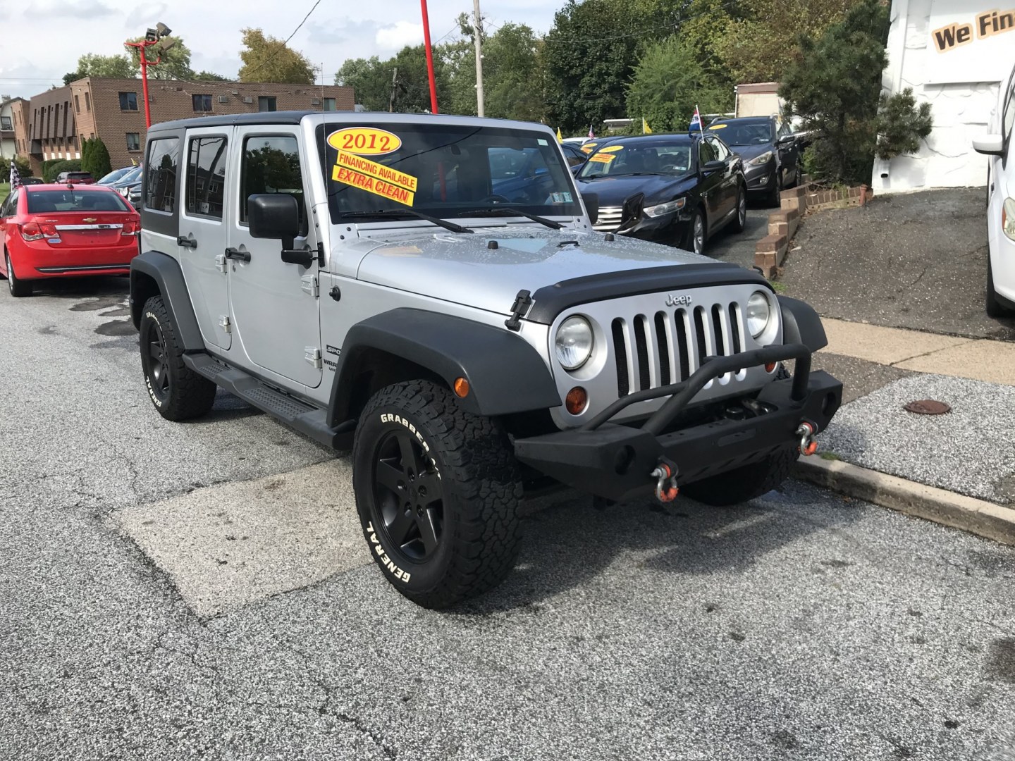 2012 Silver /Black Jeep Wrangler Unlimited Sport 4WD (1C4HJWDG3CL) with an 3.6L V6 DOHC 24V FFV engine, Manual transmission, located at 577 Chester Pike, Prospect Park, PA, 19076, (610) 237-1015, 39.886154, -75.302338 - 2012 Jeep Wrangler Unlimited Sport 4WD: Stick Shift, new PA inspection, SUPER CLEAN, runs LIKE NEW! This vehicle comes inspected and has been given a bumper to bumper safety check. It is very clean, reliable, and well maintained. We offer a unique pay plan that is known for being the easiest and- Photo#2