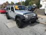 2012 Silver /Black Jeep Wrangler Unlimited Sport 4WD (1C4HJWDG3CL) with an 3.6L V6 DOHC 24V FFV engine, Manual transmission, located at 577 Chester Pike, Prospect Park, PA, 19076, (610) 237-1015, 39.886154, -75.302338 - 2012 Jeep Wrangler Unlimited Sport 4WD: Stick Shift, new PA inspection, SUPER CLEAN, runs LIKE NEW! This vehicle comes inspected and has been given a bumper to bumper safety check. It is very clean, reliable, and well maintained. We offer a unique pay plan that is known for being the easiest and- Photo#2
