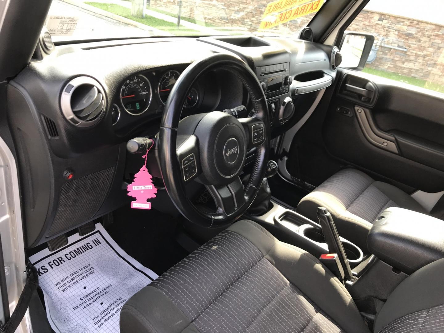 2012 Silver /Black Jeep Wrangler Unlimited Sport 4WD (1C4HJWDG3CL) with an 3.6L V6 DOHC 24V FFV engine, Manual transmission, located at 577 Chester Pike, Prospect Park, PA, 19076, (610) 237-1015, 39.886154, -75.302338 - 2012 Jeep Wrangler Unlimited Sport 4WD: Stick Shift, new PA inspection, SUPER CLEAN, runs LIKE NEW! This vehicle comes inspected and has been given a bumper to bumper safety check. It is very clean, reliable, and well maintained. We offer a unique pay plan that is known for being the easiest and- Photo#12