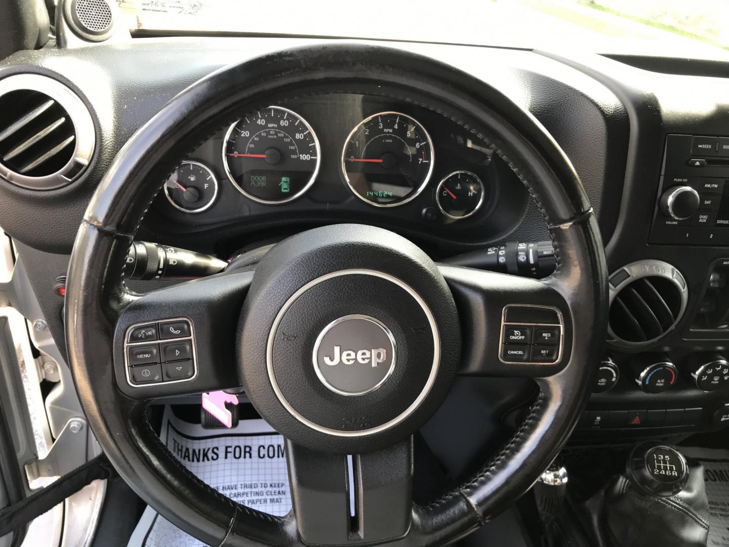 2012 Silver /Black Jeep Wrangler Unlimited Sport 4WD (1C4HJWDG3CL) with an 3.6L V6 DOHC 24V FFV engine, Manual transmission, located at 577 Chester Pike, Prospect Park, PA, 19076, (610) 237-1015, 39.886154, -75.302338 - 2012 Jeep Wrangler Unlimited Sport 4WD: Stick Shift, new PA inspection, SUPER CLEAN, runs LIKE NEW! This vehicle comes inspected and has been given a bumper to bumper safety check. It is very clean, reliable, and well maintained. We offer a unique pay plan that is known for being the easiest and- Photo#13