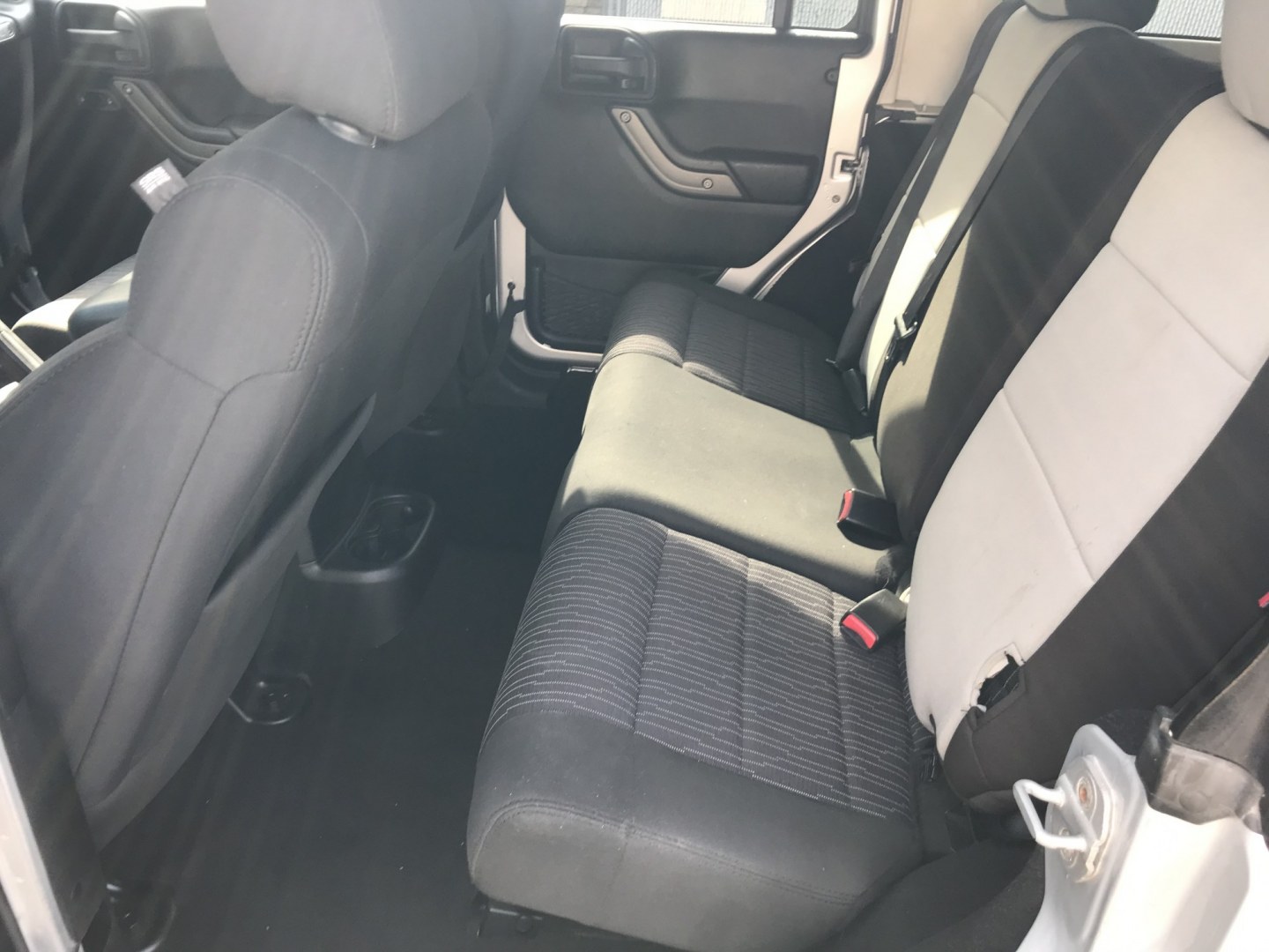 2012 Silver /Black Jeep Wrangler Unlimited Sport 4WD (1C4HJWDG3CL) with an 3.6L V6 DOHC 24V FFV engine, Manual transmission, located at 577 Chester Pike, Prospect Park, PA, 19076, (610) 237-1015, 39.886154, -75.302338 - 2012 Jeep Wrangler Unlimited Sport 4WD: Stick Shift, new PA inspection, SUPER CLEAN, runs LIKE NEW! This vehicle comes inspected and has been given a bumper to bumper safety check. It is very clean, reliable, and well maintained. We offer a unique pay plan that is known for being the easiest and- Photo#17