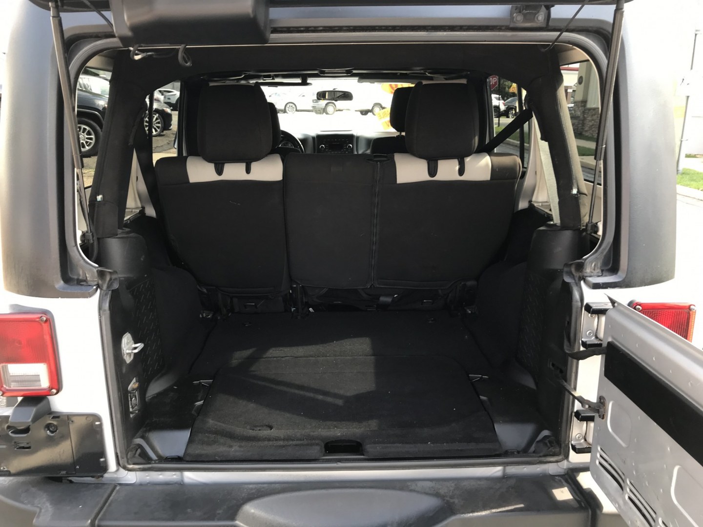 2012 Silver /Black Jeep Wrangler Unlimited Sport 4WD (1C4HJWDG3CL) with an 3.6L V6 DOHC 24V FFV engine, Manual transmission, located at 577 Chester Pike, Prospect Park, PA, 19076, (610) 237-1015, 39.886154, -75.302338 - 2012 Jeep Wrangler Unlimited Sport 4WD: Stick Shift, new PA inspection, SUPER CLEAN, runs LIKE NEW! This vehicle comes inspected and has been given a bumper to bumper safety check. It is very clean, reliable, and well maintained. We offer a unique pay plan that is known for being the easiest and- Photo#18