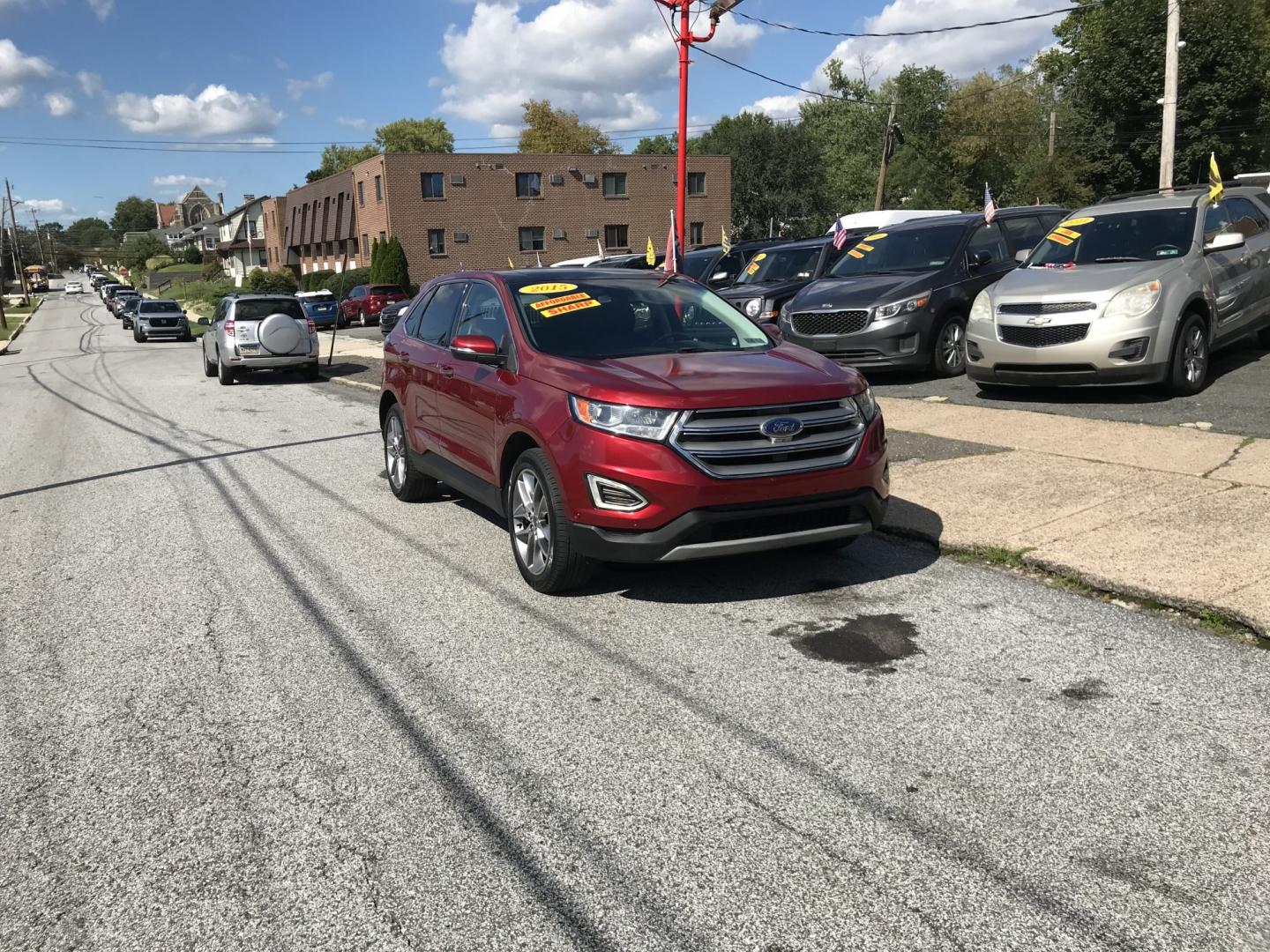 2015 Red /Black Ford Edge Titanium AWD (2FMPK4K93FB) with an 2.0L L4 DOHC 16V engine, 6A transmission, located at 577 Chester Pike, Prospect Park, PA, 19076, (610) 237-1015, 39.886154, -75.302338 - 2015 Ford Edge Titanium: Panoramic sunroof, navigation system, backup camera, new PA inspection, AWD, SUPER CLEAN, runs LIKE NEW! This vehicle comes inspected and has been given a bumper to bumper safety check. It is very clean, reliable, and well maintained. We offer a unique pay plan that is kn- Photo#1