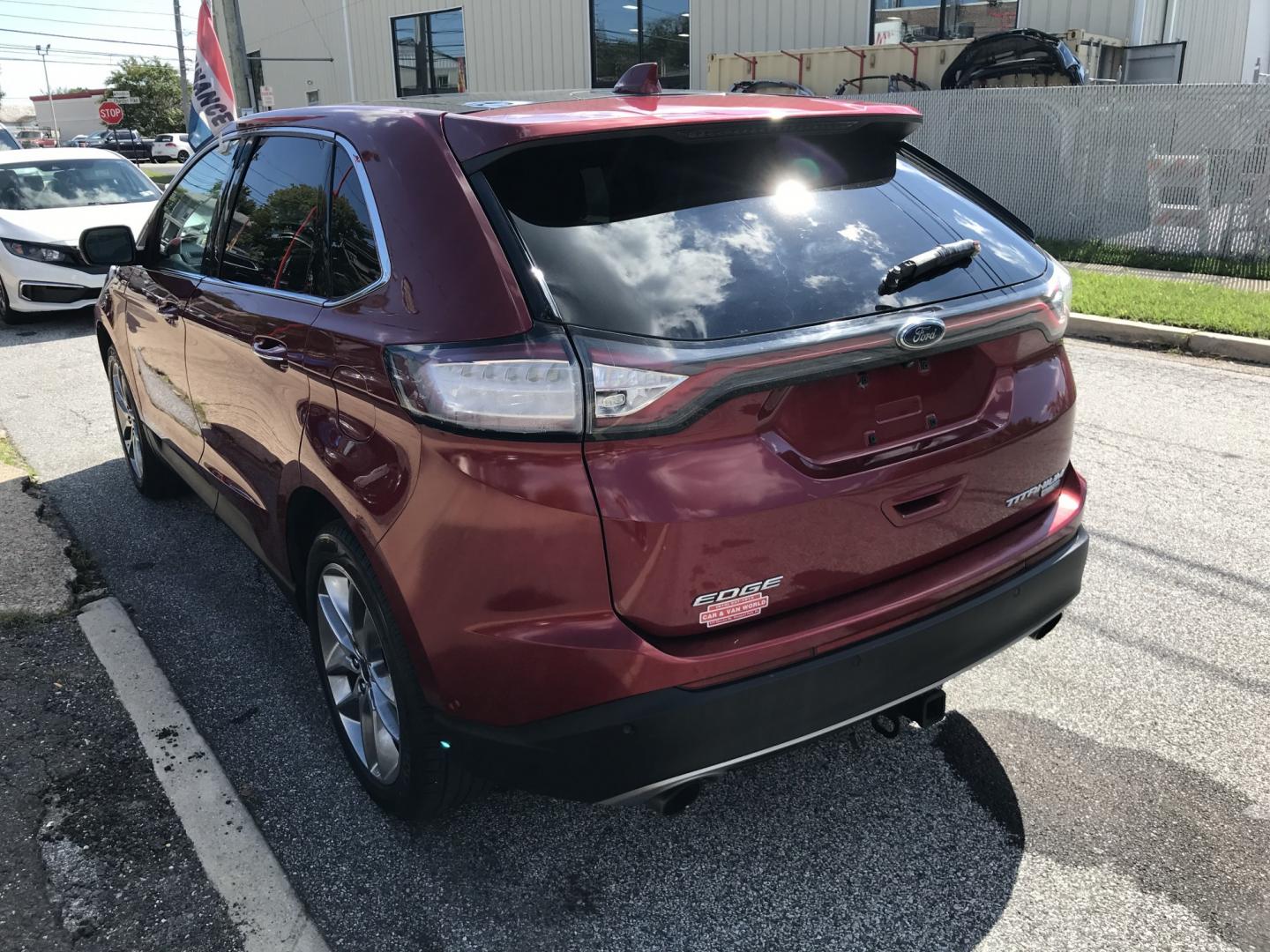2015 Red /Black Ford Edge Titanium AWD (2FMPK4K93FB) with an 2.0L L4 DOHC 16V engine, 6A transmission, located at 577 Chester Pike, Prospect Park, PA, 19076, (610) 237-1015, 39.886154, -75.302338 - 2015 Ford Edge Titanium: Panoramic sunroof, navigation system, backup camera, new PA inspection, AWD, SUPER CLEAN, runs LIKE NEW! This vehicle comes inspected and has been given a bumper to bumper safety check. It is very clean, reliable, and well maintained. We offer a unique pay plan that is kn- Photo#6