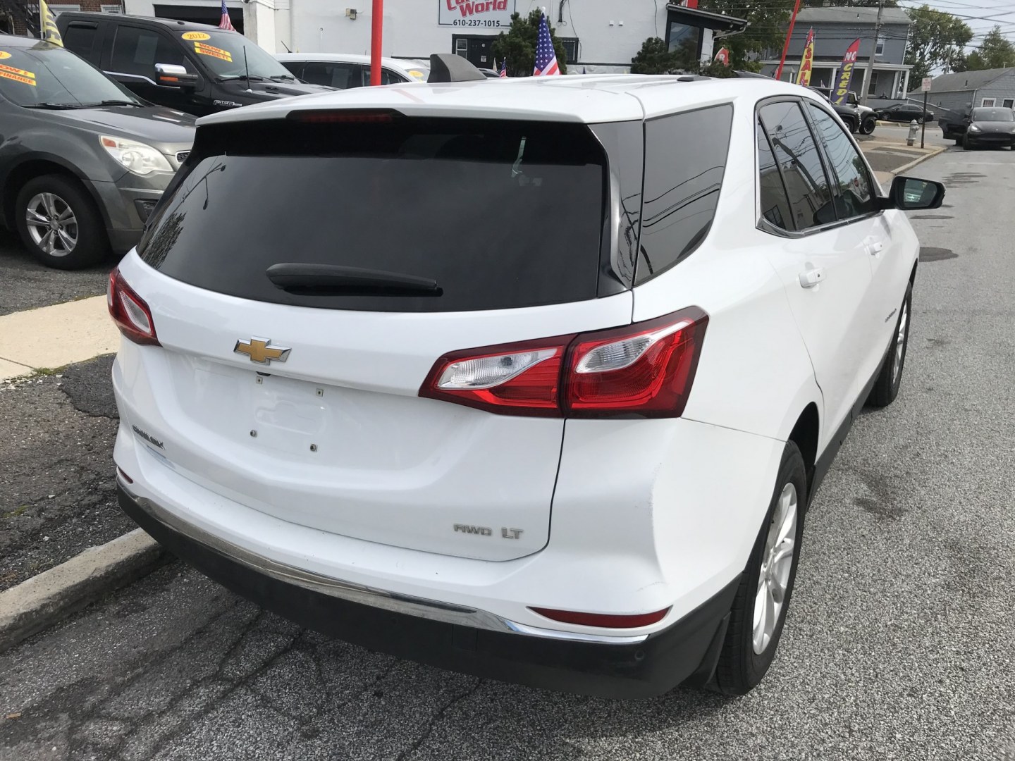 2018 White /Black Chevrolet Equinox LT AWD (2GNAXSEV9J6) with an 1.5L L4 DIR DOHC 16V TURBO engine, 6A transmission, located at 577 Chester Pike, Prospect Park, PA, 19076, (610) 237-1015, 39.886154, -75.302338 - 2018 Chevy Equinox LT: AWD, backup camera, new PA inspection, SUPER CLEAN, runs LIKE NEW! This vehicle comes inspected and has been given a bumper to bumper safety check. It is very clean, reliable, and well maintained. We offer a unique pay plan that is known for being the easiest and fastest fi- Photo#5
