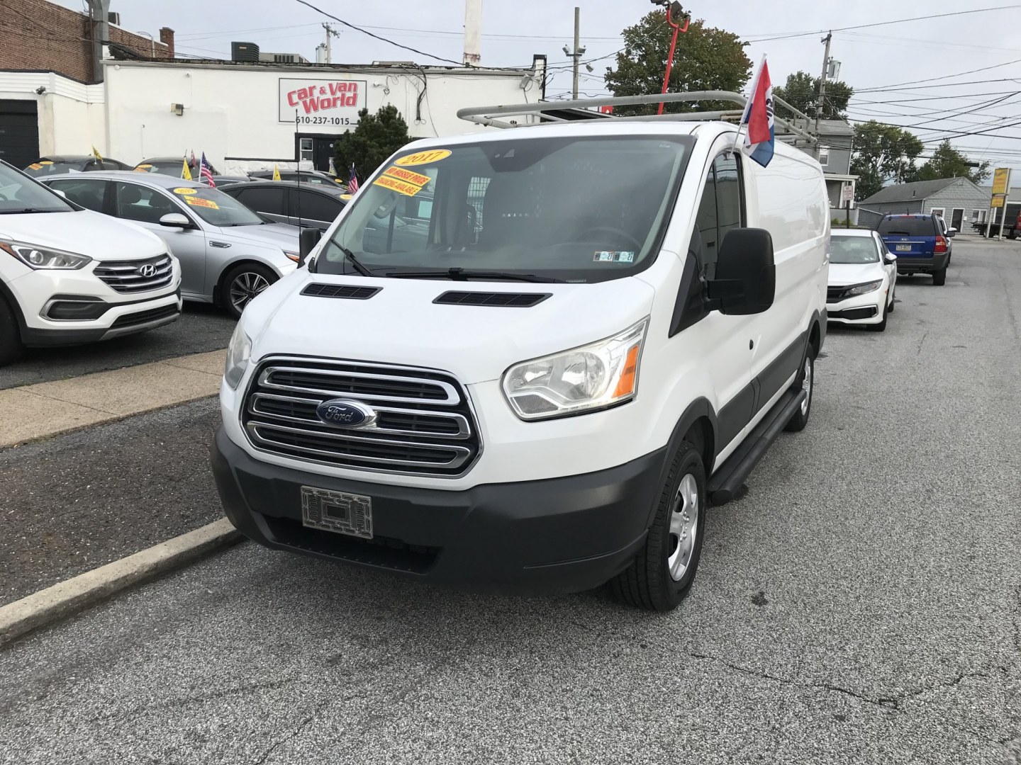 2017 White /Gray Ford Transit 250 Van Low Roof w/Sliding Pass. 130-in. WB (1FTYR1YM8HK) with an 3.7L V6 DOHC 24V engine, 6A transmission, located at 577 Chester Pike, Prospect Park, PA, 19076, (610) 237-1015, 39.886154, -75.302338 - 2017 Ford Transit 250: Ladder racks, shelving, new PA inspection, backup camera, FLEET MAINTAINED! This vehicle comes inspected and has been given a bumper to bumper safety check. It is very clean, reliable, and well maintained. We offer a unique pay plan that is known for being the easiest and f- Photo#2