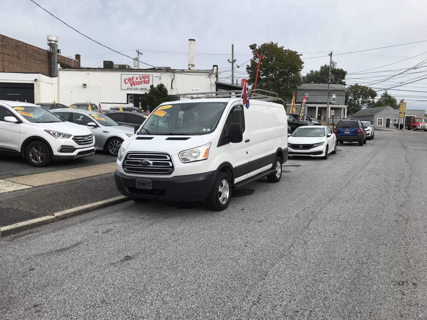 2017 White /Gray Ford Transit 250 Van Low Roof w/Sliding Pass. 130-in. WB (1FTYR1YM8HK) with an 3.7L V6 DOHC 24V engine, 6A transmission, located at 577 Chester Pike, Prospect Park, PA, 19076, (610) 237-1015, 39.886154, -75.302338 - 2017 Ford Transit 250: Ladder racks, shelving, new PA inspection, backup camera, FLEET MAINTAINED! This vehicle comes inspected and has been given a bumper to bumper safety check. It is very clean, reliable, and well maintained. We offer a unique pay plan that is known for being the easiest and f- Photo#1