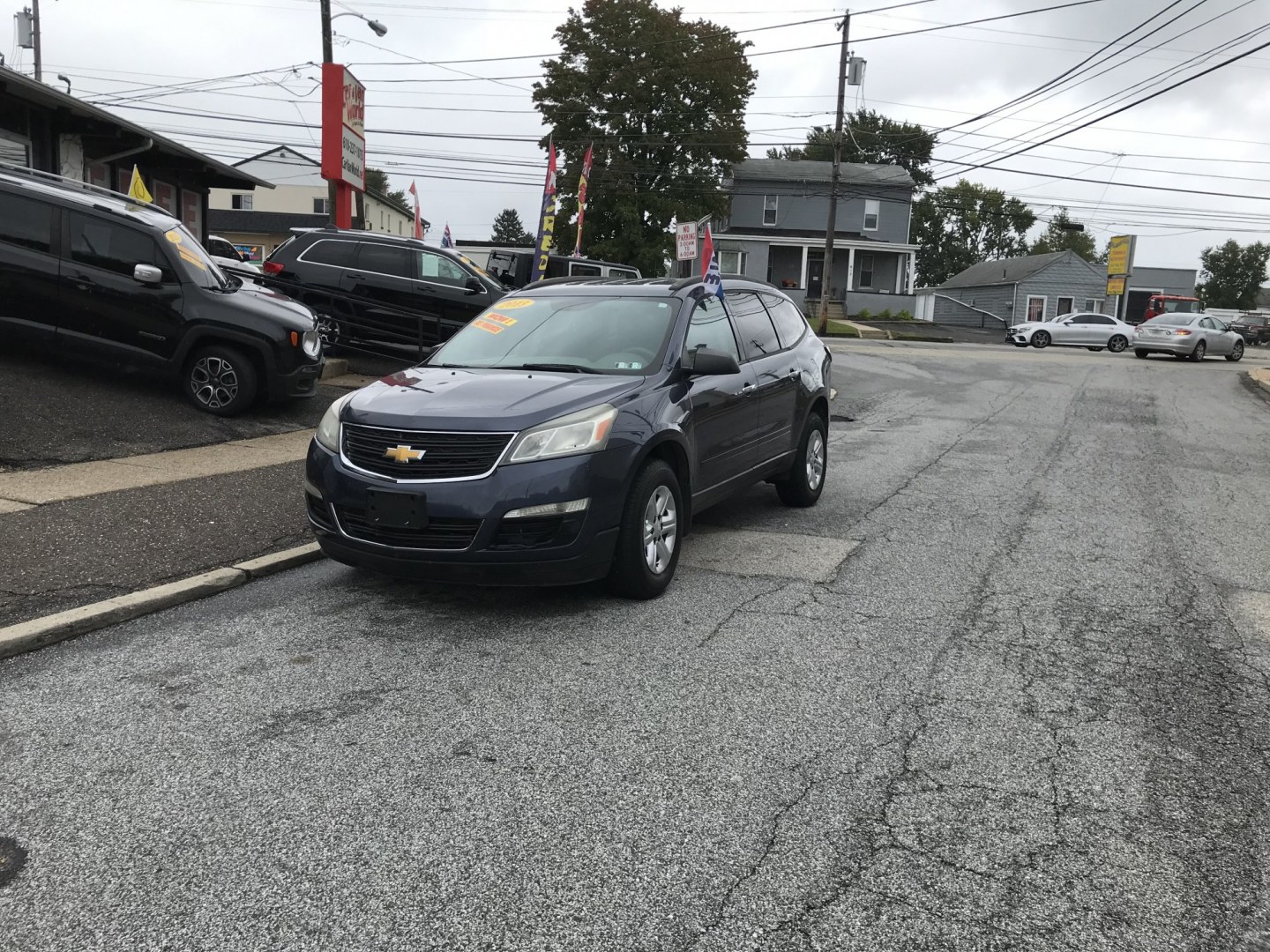 2013 Blue /Gray Chevrolet Traverse LS w/PDC (1GNKRFED0DJ) with an 3.6L V6 DOHC 24V engine, 6-Speed Automatic transmission, located at 577 Chester Pike, Prospect Park, PA, 19076, (610) 237-1015, 39.886154, -75.302338 - 2013 Chevy Traverse: Only 91k miles, 3rd row seating, backup camera, new PA inspection, SUPER CLEAN, runs LIKE NEW! This vehicle comes inspected and has been given a bumper to bumper safety check. It is very clean, reliable, and well maintained. We offer a unique pay plan that is known for being- Photo#1