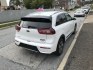 2018 White /Gray Kia Niro Plug In Hybrid EX Premium (KNDCC3LD7J5) , 6A transmission, located at 577 Chester Pike, Prospect Park, PA, 19076, (610) 237-1015, 39.886154, -75.302338 - 2018 Kia Niro Plug in Hybrid: Navigation system, backup camera, new PA inspection, EXCELLENT ON GAS! This vehicle comes inspected and has been given a bumper to bumper safety check. It is very clean, reliable, and well maintained. We offer a unique pay plan that is known for being the easiest and- Photo#4