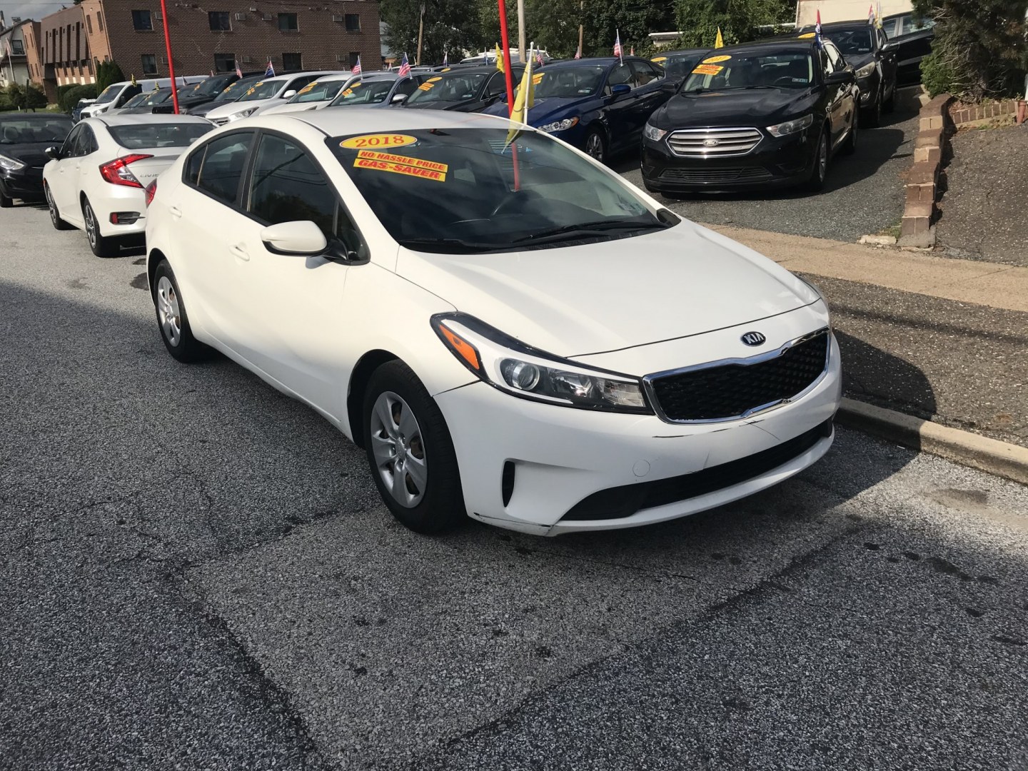 2018 White /Gray Kia Forte LX 6M (3KPFK4A73JE) with an 2.0L L4 DOHC 16V engine, 6M transmission, located at 577 Chester Pike, Prospect Park, PA, 19076, (610) 237-1015, 39.886154, -75.302338 - 2018 Kia Forte: Backup camera, new PA inspection, great on gas, SUPER CLEAN, runs LIKE NEW! This vehicle comes inspected and has been given a bumper to bumper safety check. It is very clean, reliable, and well maintained. We offer a unique pay plan that is known for being the easiest and fastest- Photo#2