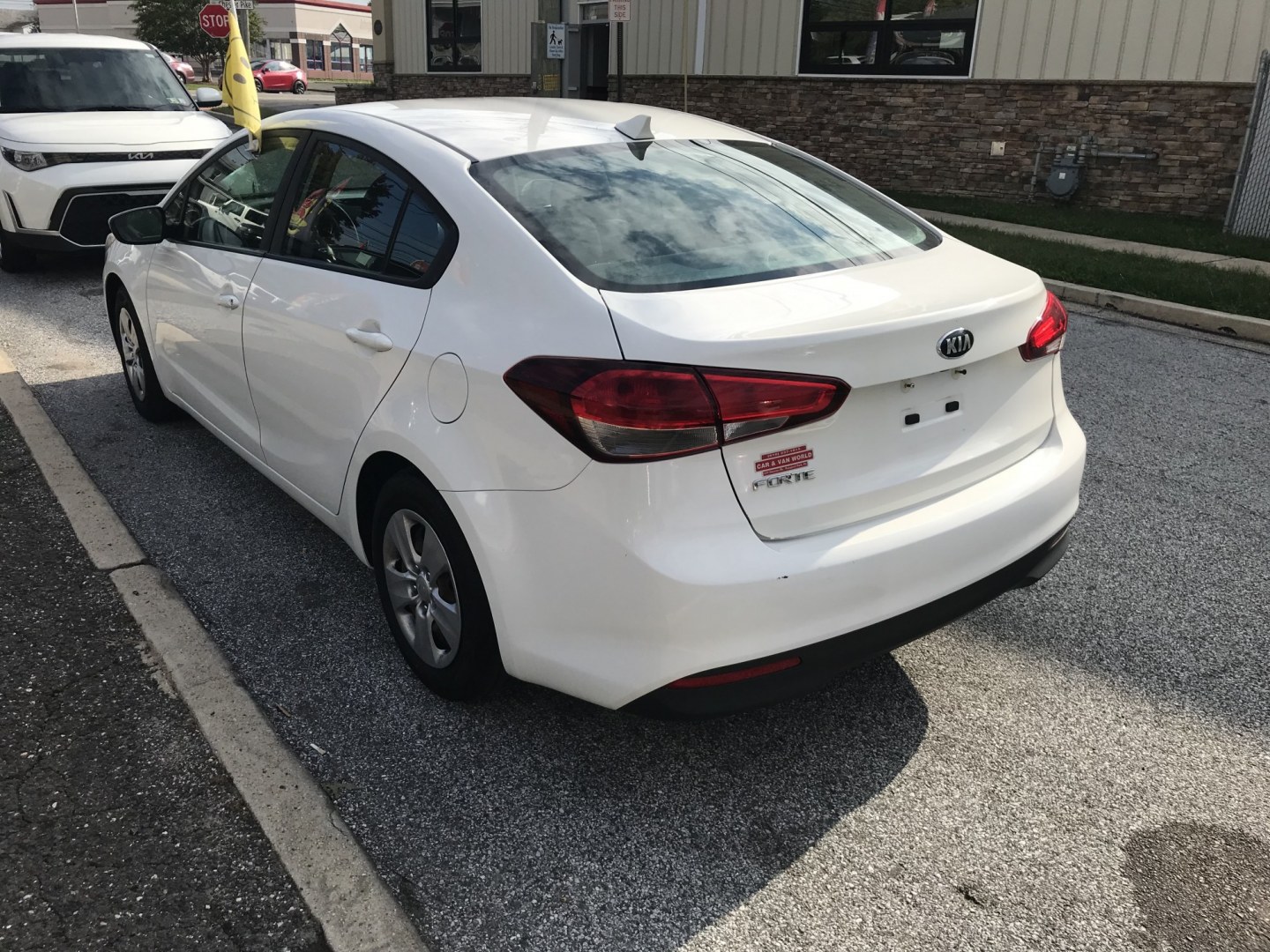 2018 White /Gray Kia Forte LX 6M (3KPFK4A73JE) with an 2.0L L4 DOHC 16V engine, 6M transmission, located at 577 Chester Pike, Prospect Park, PA, 19076, (610) 237-1015, 39.886154, -75.302338 - 2018 Kia Forte: Backup camera, new PA inspection, great on gas, SUPER CLEAN, runs LIKE NEW! This vehicle comes inspected and has been given a bumper to bumper safety check. It is very clean, reliable, and well maintained. We offer a unique pay plan that is known for being the easiest and fastest- Photo#5
