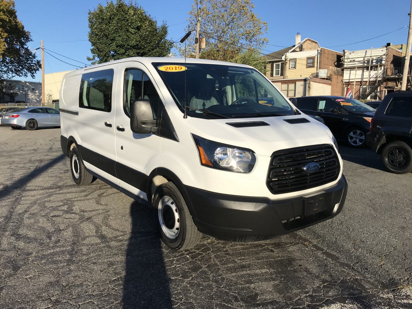 2019 White /Gray Ford Transit 150 Van Low Roof w/Sliding Pass. 130-in. WB (1FTYE1YM2KK) with an 3.7L V6 DOHC 24V engine, 6A transmission, located at 577 Chester Pike, Prospect Park, PA, 19076, (610) 237-1015, 39.886154, -75.302338 - 2019 Ford Transit 150: Multiple pieces of shelving, backup camera, partition, new PA inspection, runs LIKE NEW! This vehicle comes inspected and has been given a bumper to bumper safety check. It is very clean, reliable, and well maintained. We offer a unique pay plan that is known for being the- Photo#2