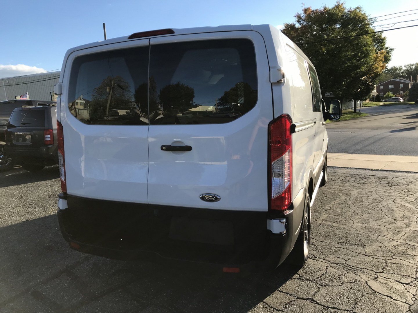 2019 White /Gray Ford Transit 150 Van Low Roof w/Sliding Pass. 130-in. WB (1FTYE1YM2KK) with an 3.7L V6 DOHC 24V engine, 6A transmission, located at 577 Chester Pike, Prospect Park, PA, 19076, (610) 237-1015, 39.886154, -75.302338 - 2019 Ford Transit 150: Multiple pieces of shelving, backup camera, partition, new PA inspection, runs LIKE NEW! This vehicle comes inspected and has been given a bumper to bumper safety check. It is very clean, reliable, and well maintained. We offer a unique pay plan that is known for being the- Photo#6