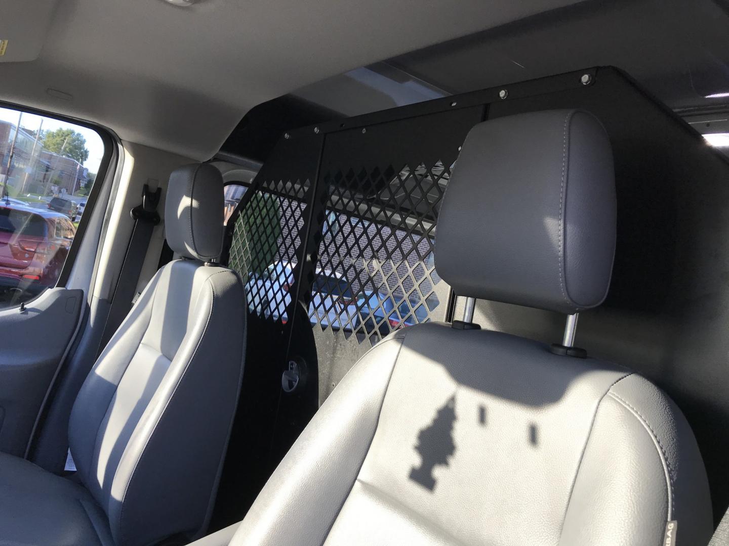 2019 White /Gray Ford Transit 150 Van Low Roof w/Sliding Pass. 130-in. WB (1FTYE1YM2KK) with an 3.7L V6 DOHC 24V engine, 6A transmission, located at 577 Chester Pike, Prospect Park, PA, 19076, (610) 237-1015, 39.886154, -75.302338 - 2019 Ford Transit 150: Multiple pieces of shelving, backup camera, partition, new PA inspection, runs LIKE NEW! This vehicle comes inspected and has been given a bumper to bumper safety check. It is very clean, reliable, and well maintained. We offer a unique pay plan that is known for being the- Photo#10