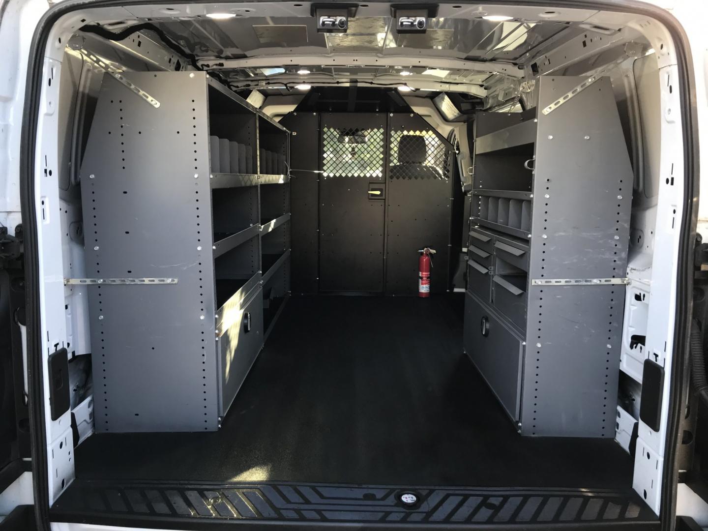 2019 White /Gray Ford Transit 150 Van Low Roof w/Sliding Pass. 130-in. WB (1FTYE1YM2KK) with an 3.7L V6 DOHC 24V engine, 6A transmission, located at 577 Chester Pike, Prospect Park, PA, 19076, (610) 237-1015, 39.886154, -75.302338 - 2019 Ford Transit 150: Multiple pieces of shelving, backup camera, partition, new PA inspection, runs LIKE NEW! This vehicle comes inspected and has been given a bumper to bumper safety check. It is very clean, reliable, and well maintained. We offer a unique pay plan that is known for being the- Photo#14