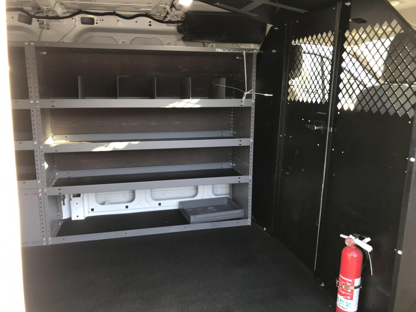2019 White /Gray Ford Transit 150 Van Low Roof w/Sliding Pass. 130-in. WB (1FTYE1YM2KK) with an 3.7L V6 DOHC 24V engine, 6A transmission, located at 577 Chester Pike, Prospect Park, PA, 19076, (610) 237-1015, 39.886154, -75.302338 - 2019 Ford Transit 150: Multiple pieces of shelving, backup camera, partition, new PA inspection, runs LIKE NEW! This vehicle comes inspected and has been given a bumper to bumper safety check. It is very clean, reliable, and well maintained. We offer a unique pay plan that is known for being the- Photo#17