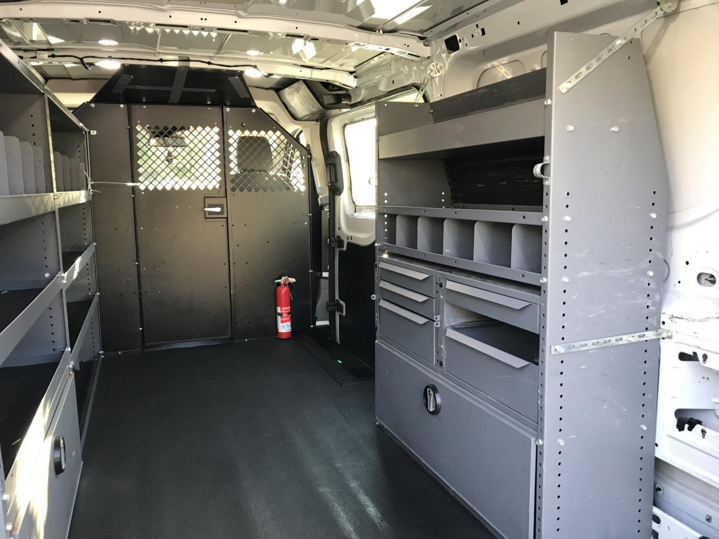 2019 White /Gray Ford Transit 150 Van Low Roof w/Sliding Pass. 130-in. WB (1FTYE1YM2KK) with an 3.7L V6 DOHC 24V engine, 6A transmission, located at 577 Chester Pike, Prospect Park, PA, 19076, (610) 237-1015, 39.886154, -75.302338 - 2019 Ford Transit 150: Multiple pieces of shelving, backup camera, partition, new PA inspection, runs LIKE NEW! This vehicle comes inspected and has been given a bumper to bumper safety check. It is very clean, reliable, and well maintained. We offer a unique pay plan that is known for being the- Photo#16