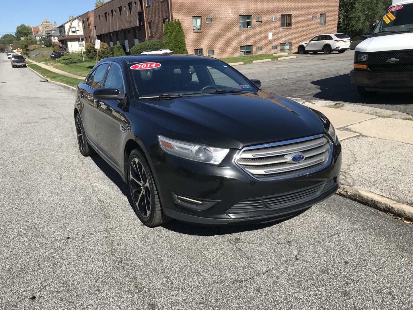 2014 Black /Black Ford Taurus SEL (1FAHP2E89EG) with an 3.5L V6 DOHC 24V engine, 6-Speed Automatic transmission, located at 577 Chester Pike, Prospect Park, PA, 19076, (610) 237-1015, 39.886154, -75.302338 - 2014 Ford Taurus SEL: Backup camera, new PA inspection, SUPER CLEAN, runs LIKE NEW! This vehicle comes inspected and has been given a bumper to bumper safety check. It is very clean, reliable, and well maintained. We offer a unique pay plan that is known for being the easiest and fastest financin- Photo#2