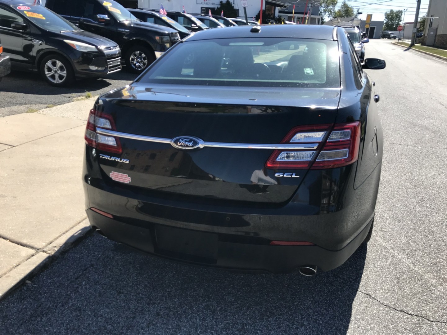 2014 Black /Black Ford Taurus SEL (1FAHP2E89EG) with an 3.5L V6 DOHC 24V engine, 6-Speed Automatic transmission, located at 577 Chester Pike, Prospect Park, PA, 19076, (610) 237-1015, 39.886154, -75.302338 - 2014 Ford Taurus SEL: Backup camera, new PA inspection, SUPER CLEAN, runs LIKE NEW! This vehicle comes inspected and has been given a bumper to bumper safety check. It is very clean, reliable, and well maintained. We offer a unique pay plan that is known for being the easiest and fastest financin- Photo#6