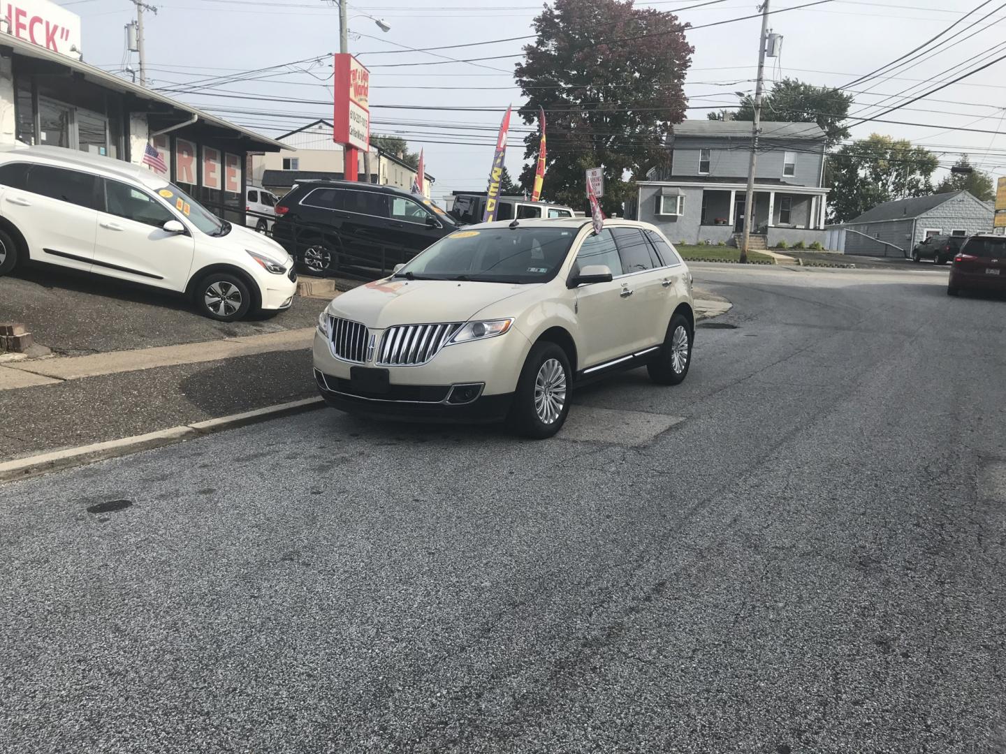 2015 Cream /Black Lincoln MKX AWD (2LMDJ8JK5FB) with an 3.7L V6 DOHC 24V engine, 6A transmission, located at 577 Chester Pike, Prospect Park, PA, 19076, (610) 237-1015, 39.886154, -75.302338 - 2015 Lincoln MKX: Only 94k miles, new PA inspection, SUPER CLEAN, runs LIKE NEW! This vehicle comes inspected and has been given a bumper to bumper safety check. It is very clean, reliable, and well maintained. We offer a unique pay plan that is known for being the easiest and fastest financing o- Photo#1