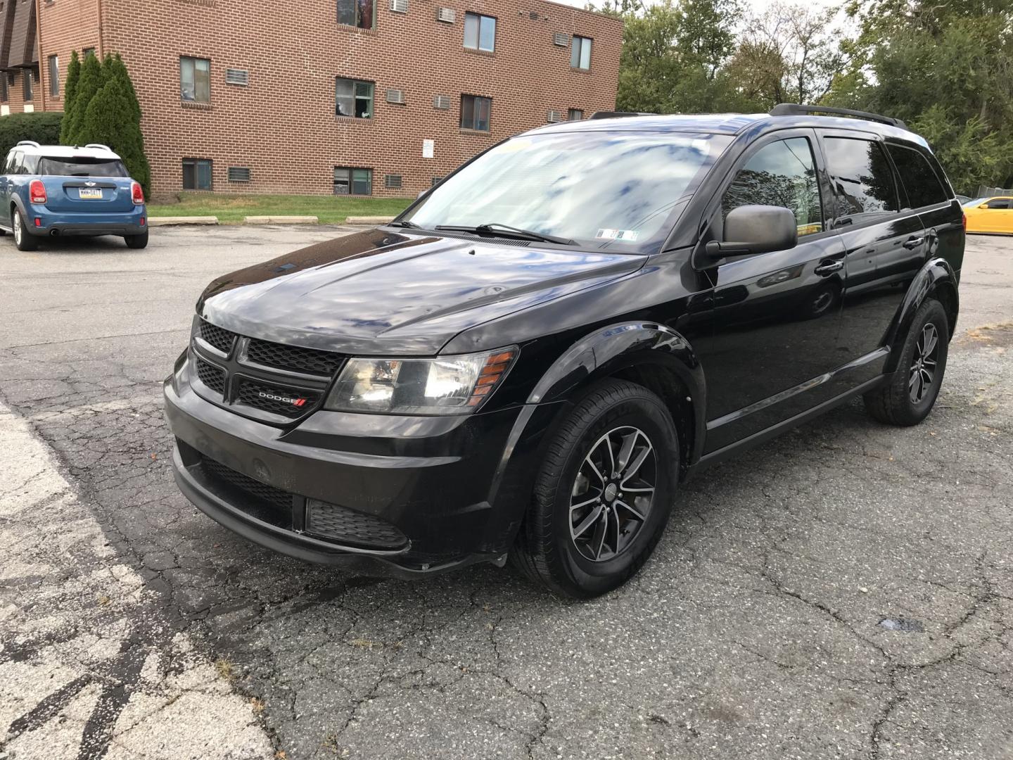 2017 Black /Black Dodge Journey SE (3C4PDCAB5HT) with an 2.4L L4 DOHC 16V engine, 4A transmission, located at 577 Chester Pike, Prospect Park, PA, 19076, (610) 237-1015, 39.886154, -75.302338 - 2017 Dodge Journey SE: Only 105k miles, 3rd row seating, new PA inspection, SUPER CLEAN, runs LIKE NEW! This vehicle comes inspected and has been given a bumper to bumper safety check. It is very clean, reliable, and well maintained. We offer a unique pay plan that is known for being the easiest- Photo#2