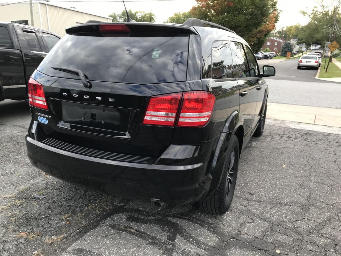 2017 Black /Black Dodge Journey SE (3C4PDCAB5HT) with an 2.4L L4 DOHC 16V engine, 4A transmission, located at 577 Chester Pike, Prospect Park, PA, 19076, (610) 237-1015, 39.886154, -75.302338 - 2017 Dodge Journey SE: Only 105k miles, 3rd row seating, new PA inspection, SUPER CLEAN, runs LIKE NEW! This vehicle comes inspected and has been given a bumper to bumper safety check. It is very clean, reliable, and well maintained. We offer a unique pay plan that is known for being the easiest- Photo#5