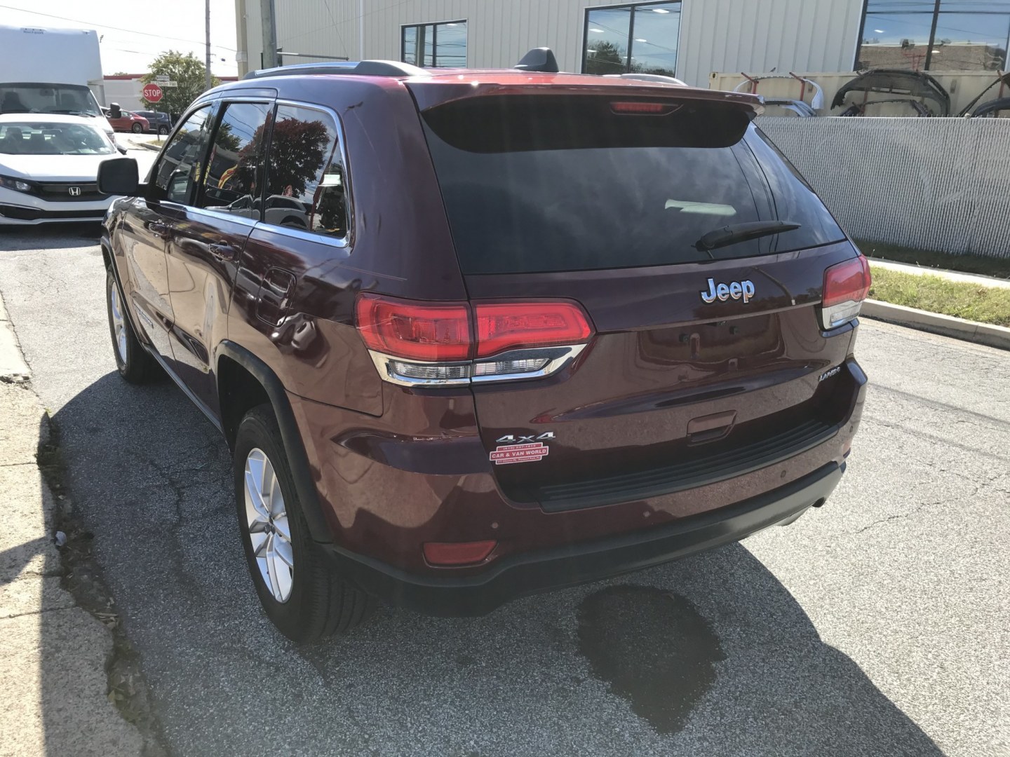 2017 Maroon /Gray Jeep Grand Cherokee Laredo 4WD (1C4RJFAG7HC) with an 3.6L V6 DOHC 24V engine, 8A transmission, located at 577 Chester Pike, Prospect Park, PA, 19076, (610) 237-1015, 39.886154, -75.302338- Photo#3