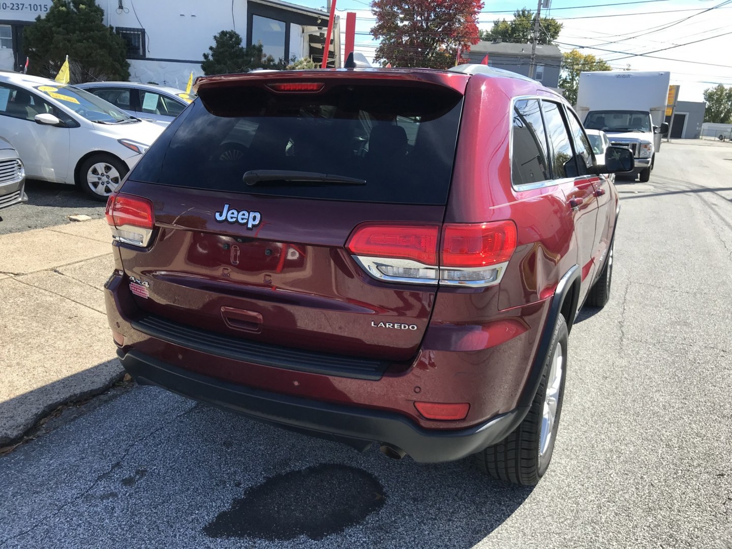 2017 Maroon /Gray Jeep Grand Cherokee Laredo 4WD (1C4RJFAG7HC) with an 3.6L V6 DOHC 24V engine, 8A transmission, located at 577 Chester Pike, Prospect Park, PA, 19076, (610) 237-1015, 39.886154, -75.302338- Photo#4